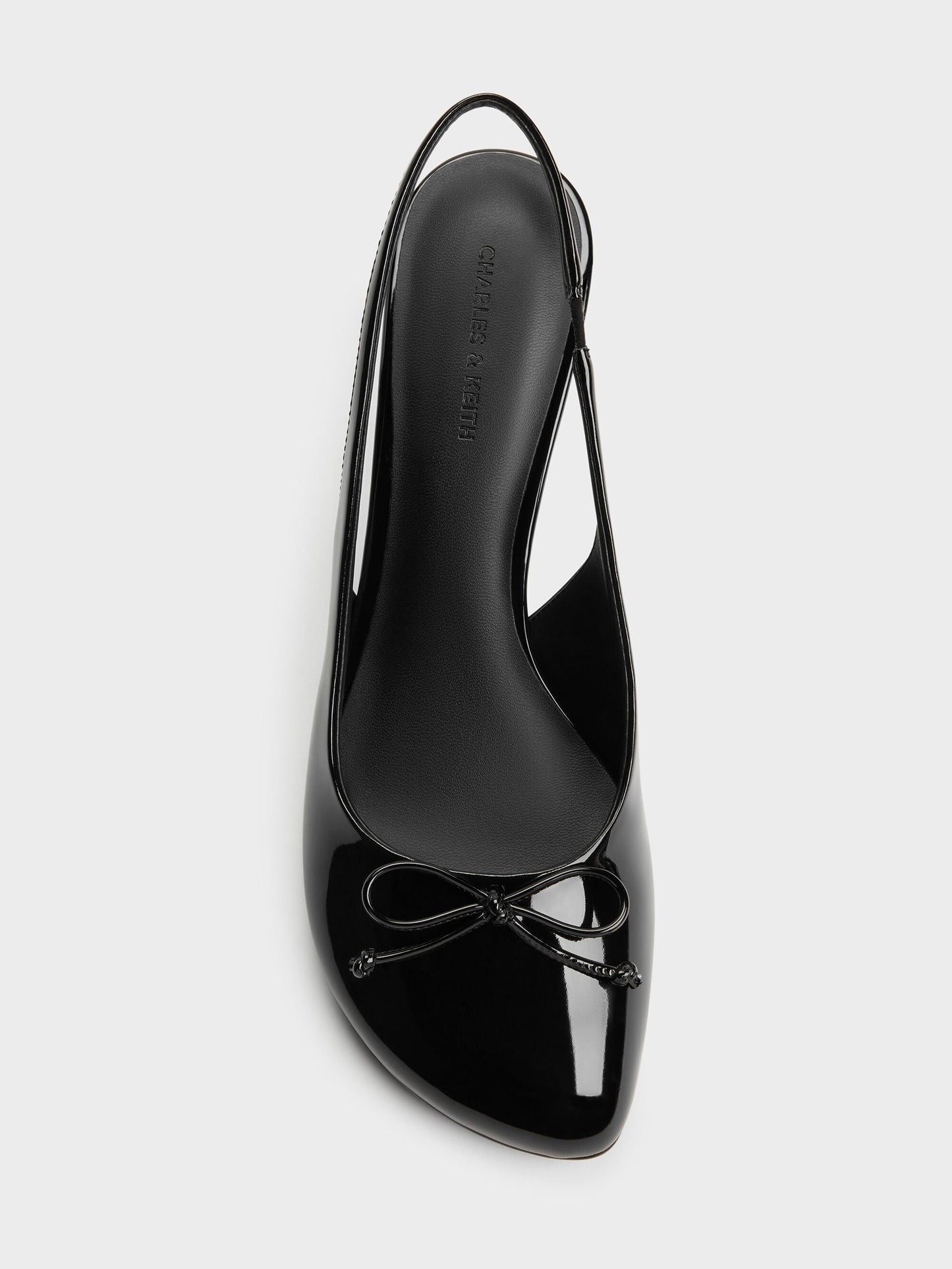 Imani Patent Asymmetric Slingback Pumps - Black Patent | CHARLES & KEITH