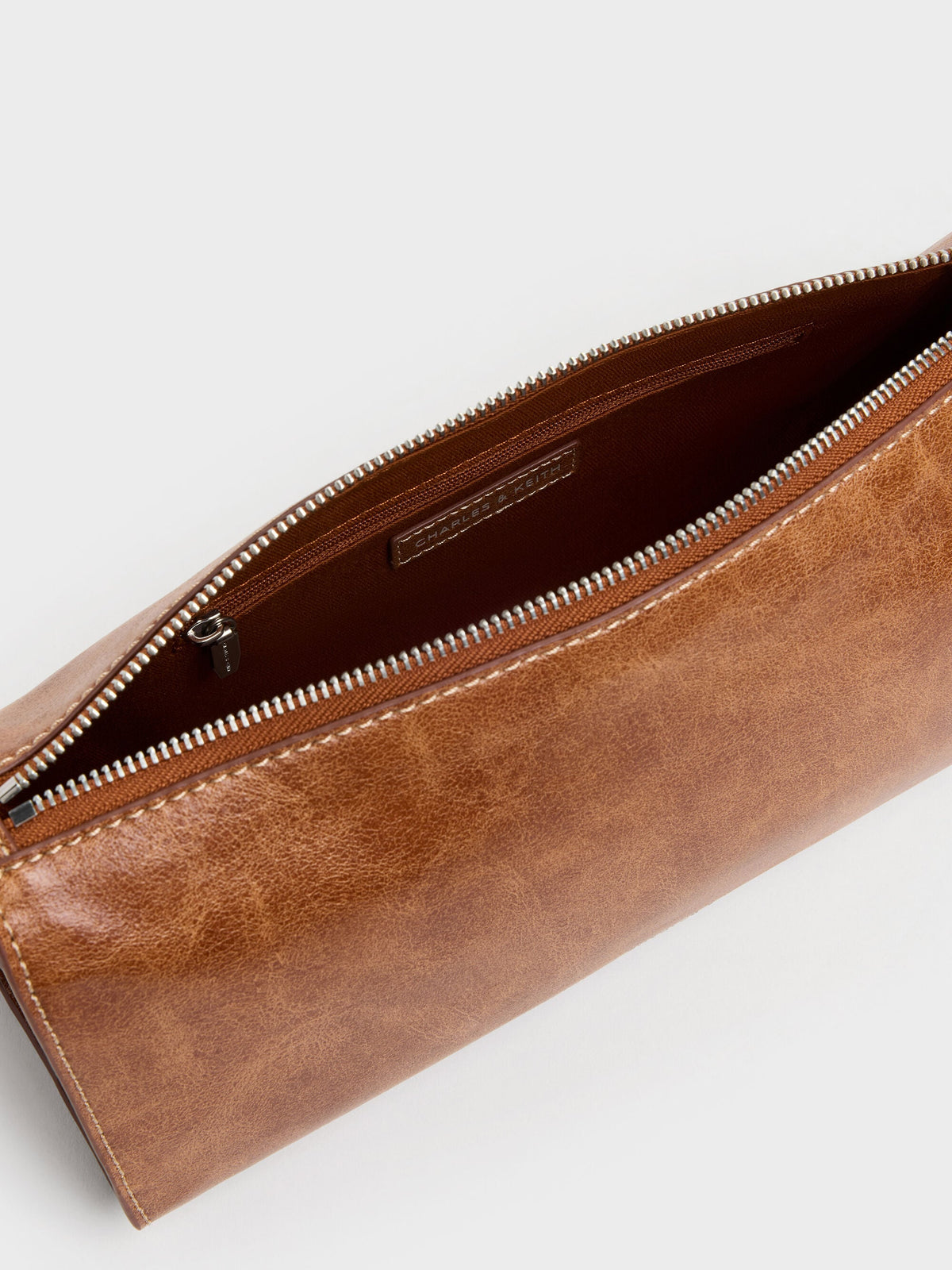 Delfina Elongated Shoulder Bag - Distressed Tan | CHARLES & KEITH