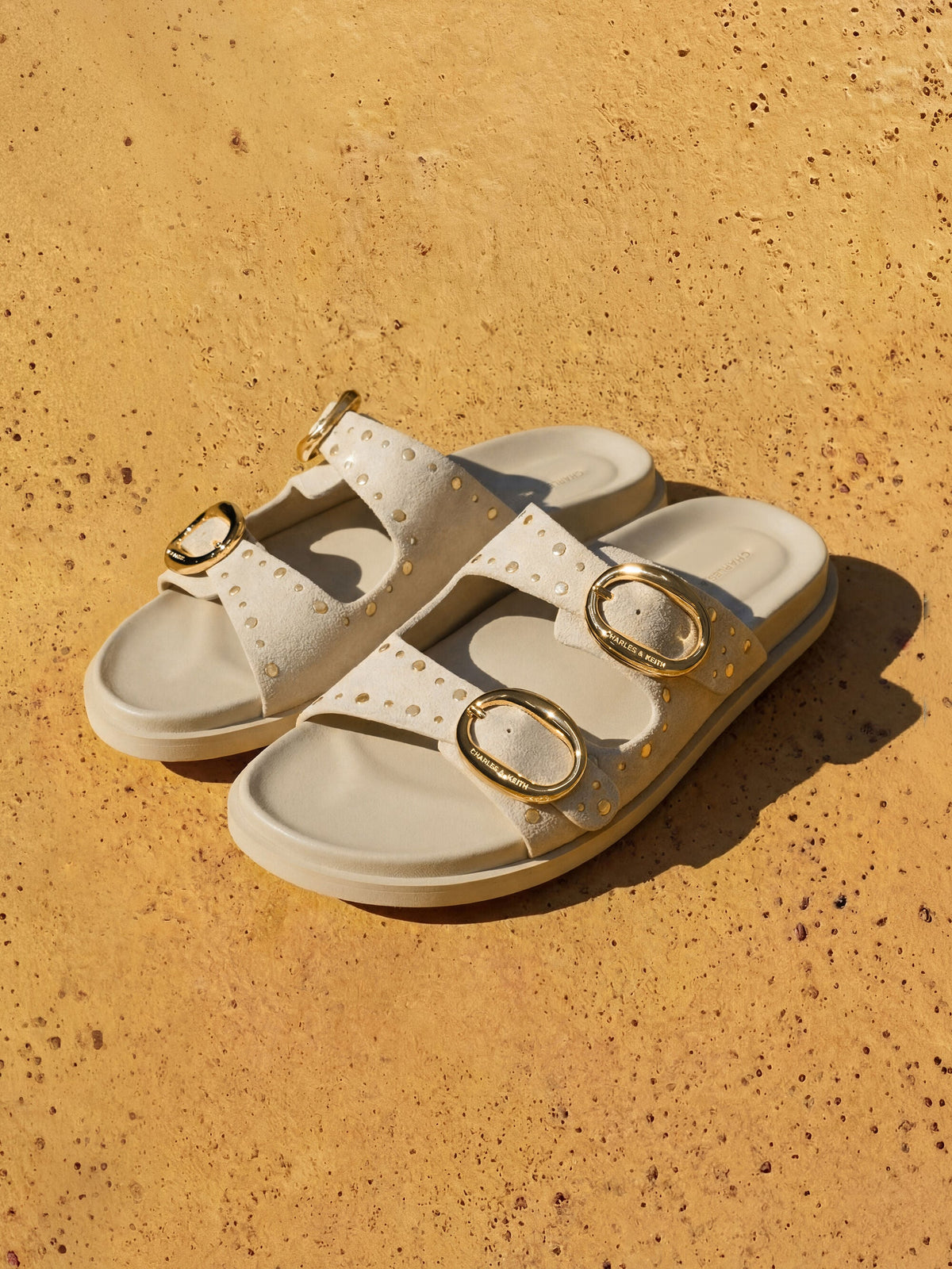 Studded Buckled Double-Strap Slides - Beige | CHARLES & KEITH