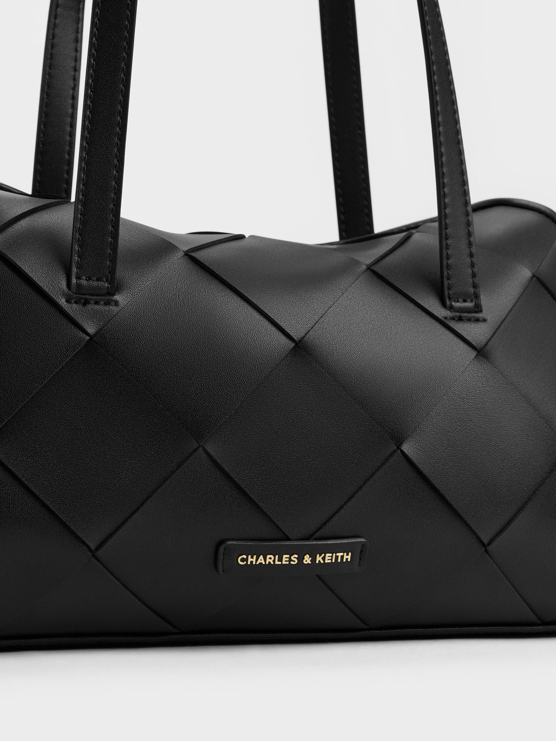 Maribel Woven Trapeze Shoulder Bag - Black | CHARLES & KEITH