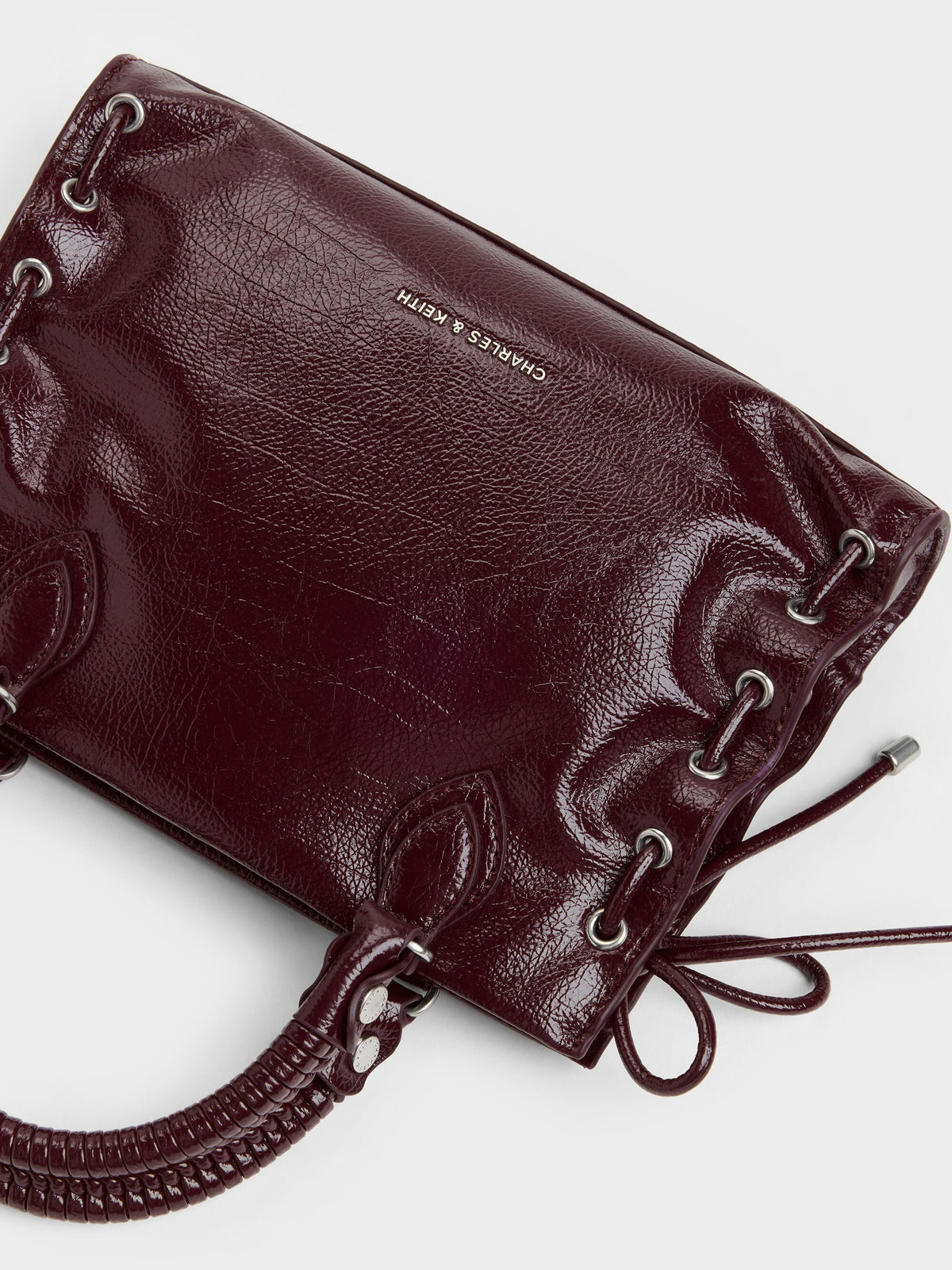 Mini Nylah Grommet Lace-Up Tote Bag - Wineberry Red | CHARLES & KEITH