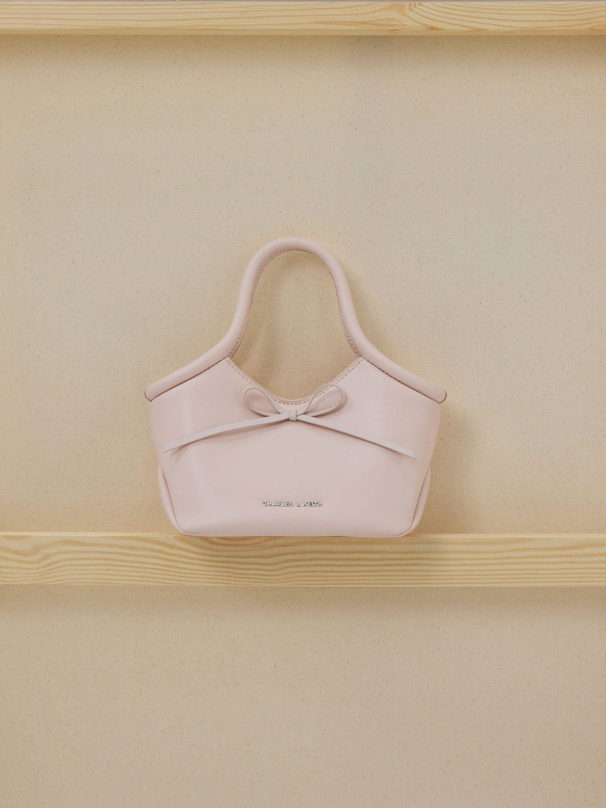 Hazel Bow Tubular Top Handle Bag - Soft Pink | CHARLES & KEITH