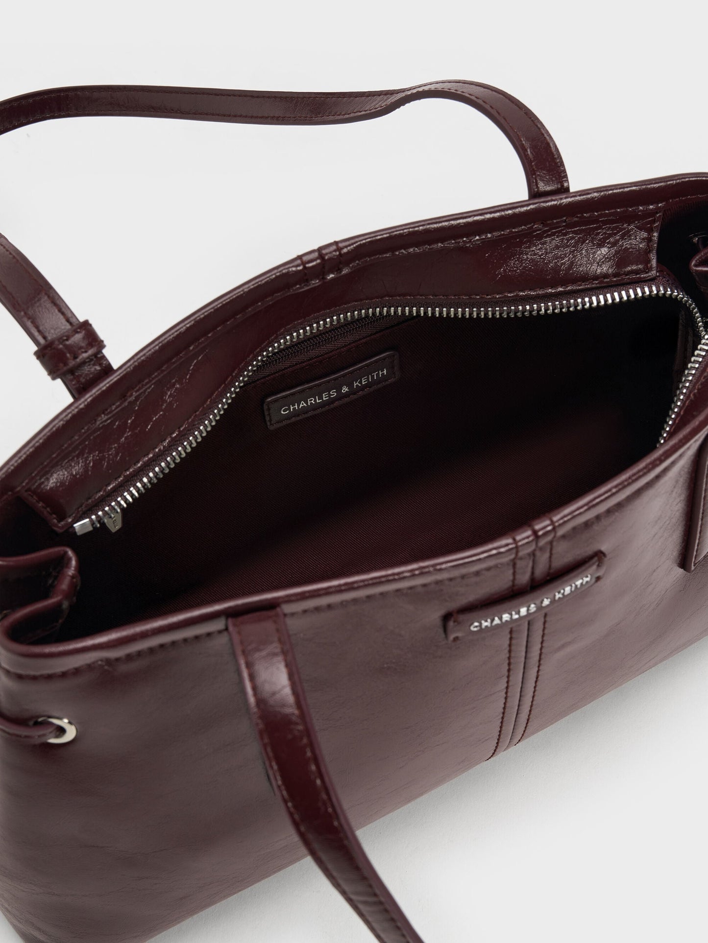 Noane Elongated-Handle Shoulder Bag - Wineberry Red | CHARLES & KEITH