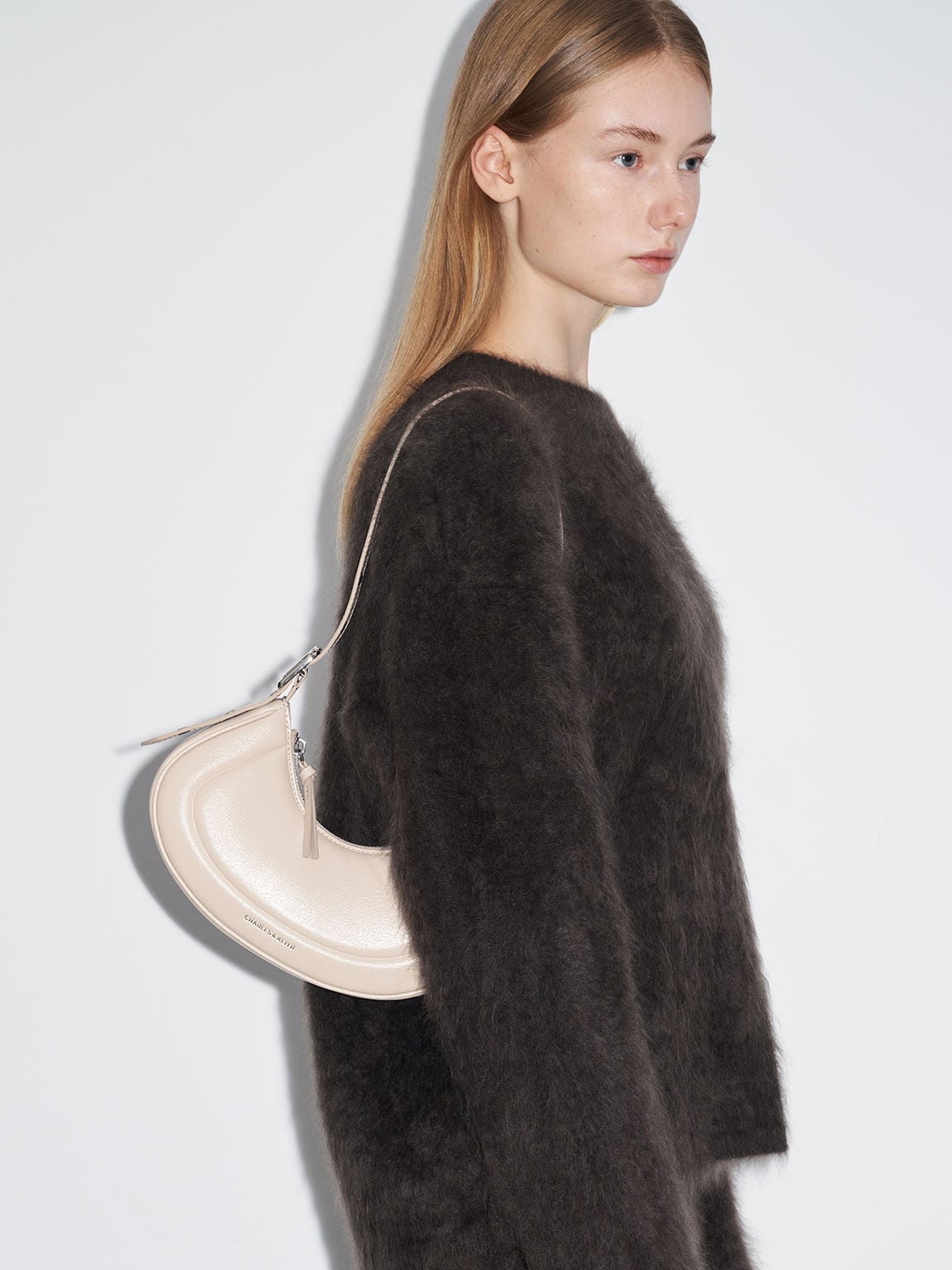 Petra Curved Shoulder Bag - Oat | CHARLES & KEITH