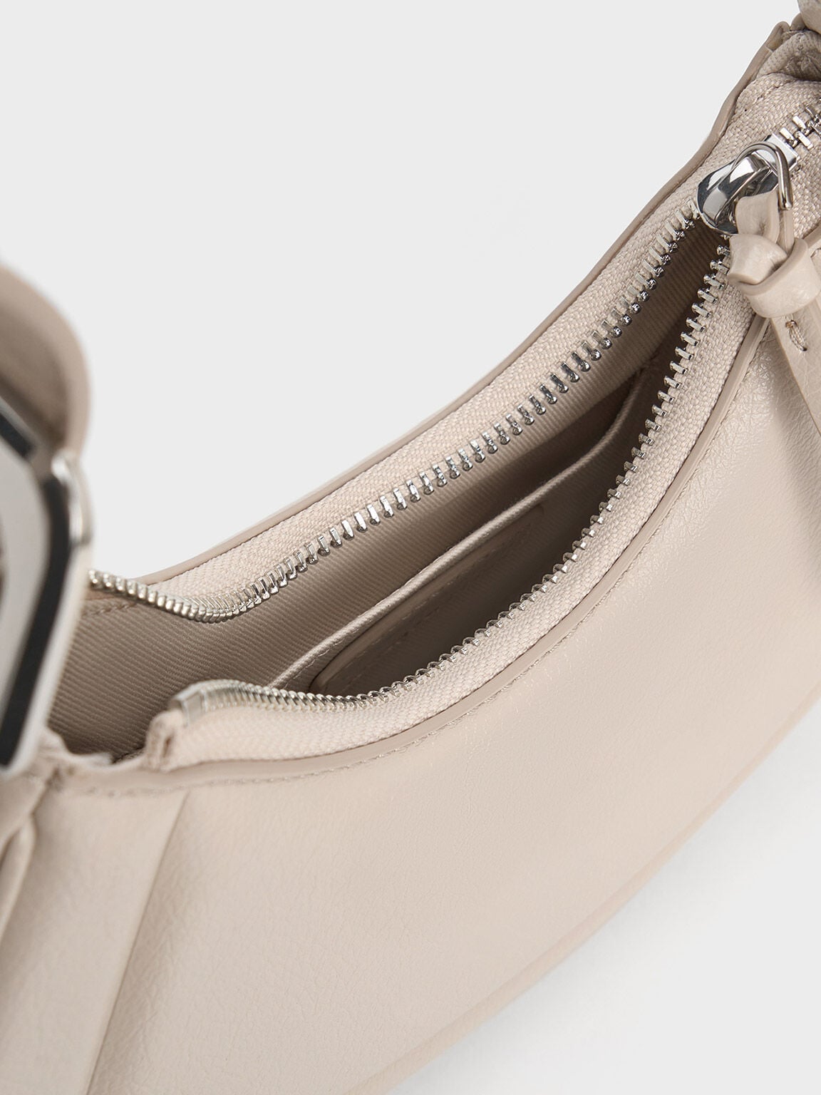 Petra Curved Shoulder Bag - Oat | CHARLES & KEITH