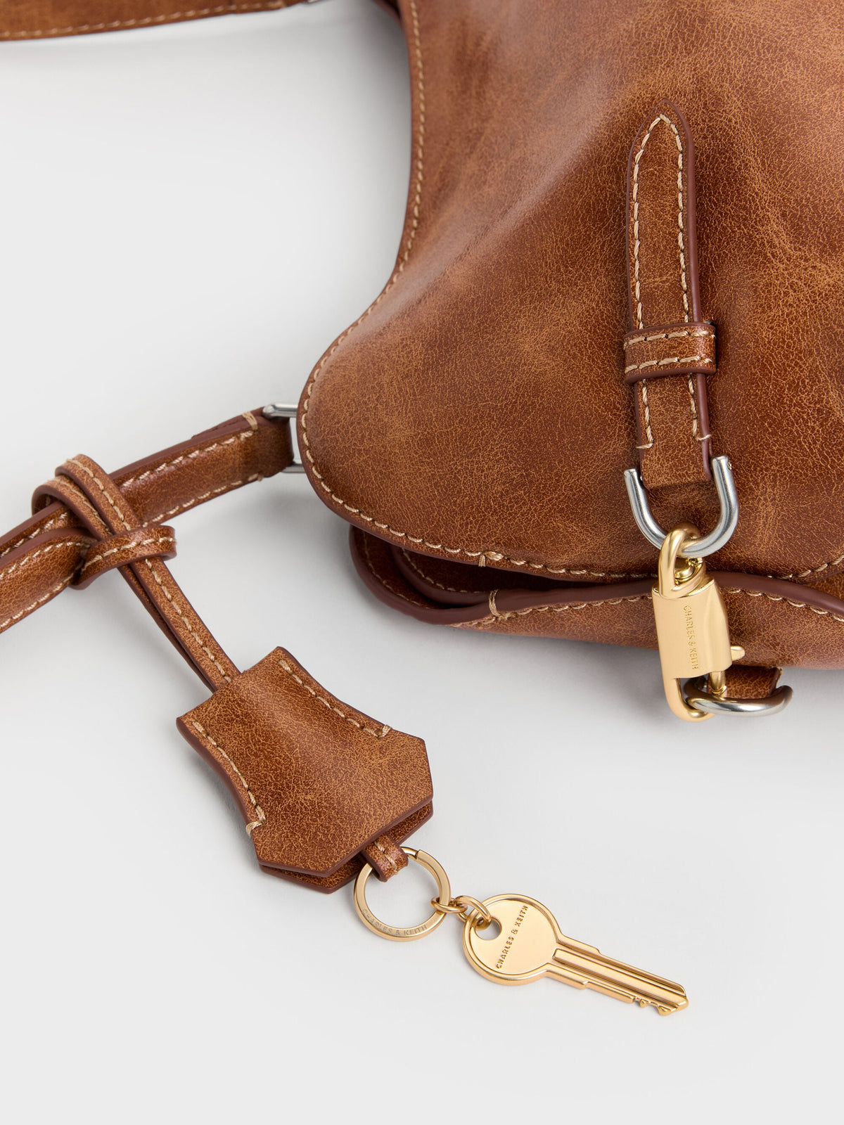 Delfina Chain Side-Belt Shoulder Bag - Distressed Tan | CHARLES & KEITH