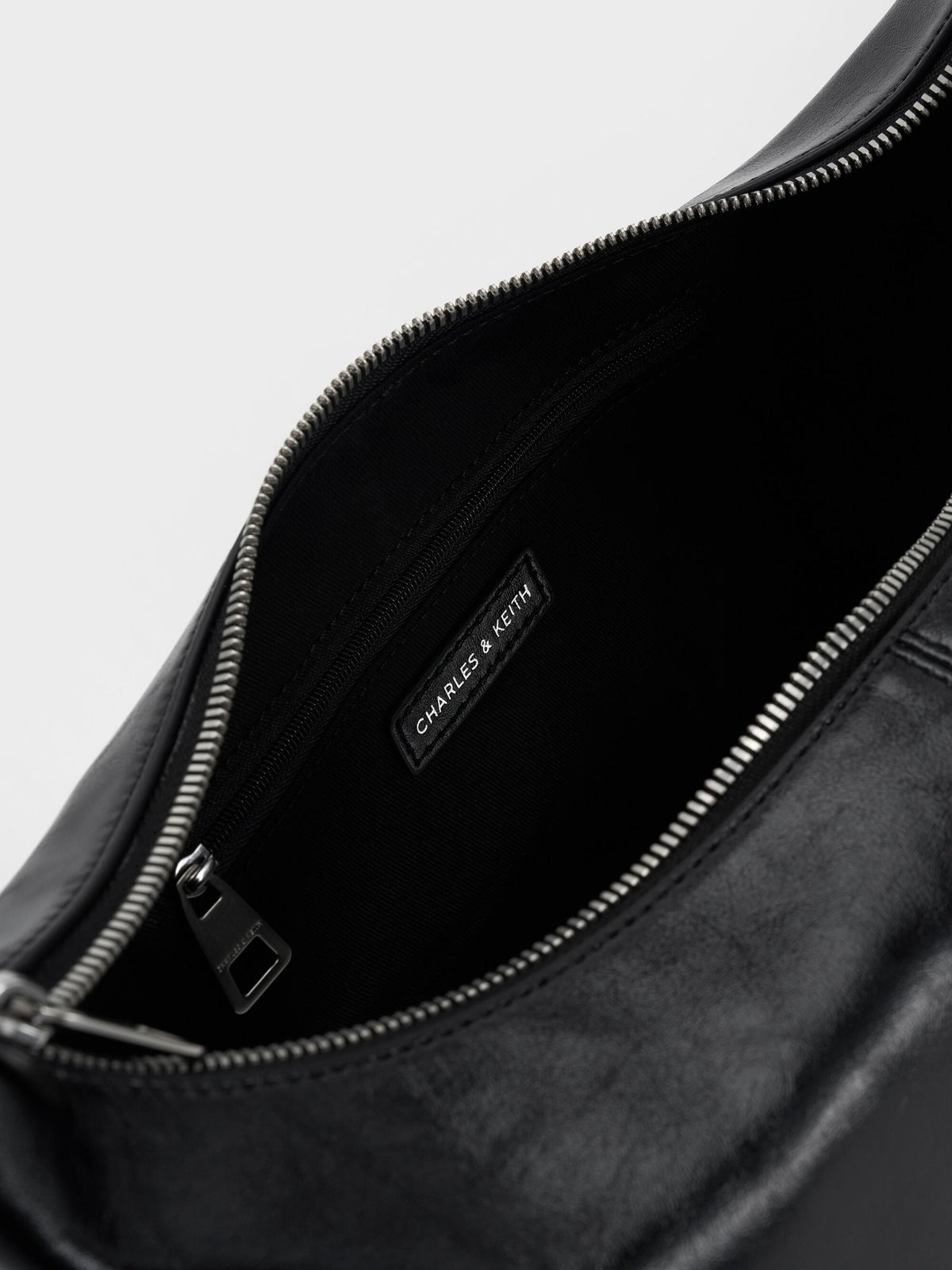 Bessie Side-Pocket Hobo Bag - Noir | CHARLES & KEITH
