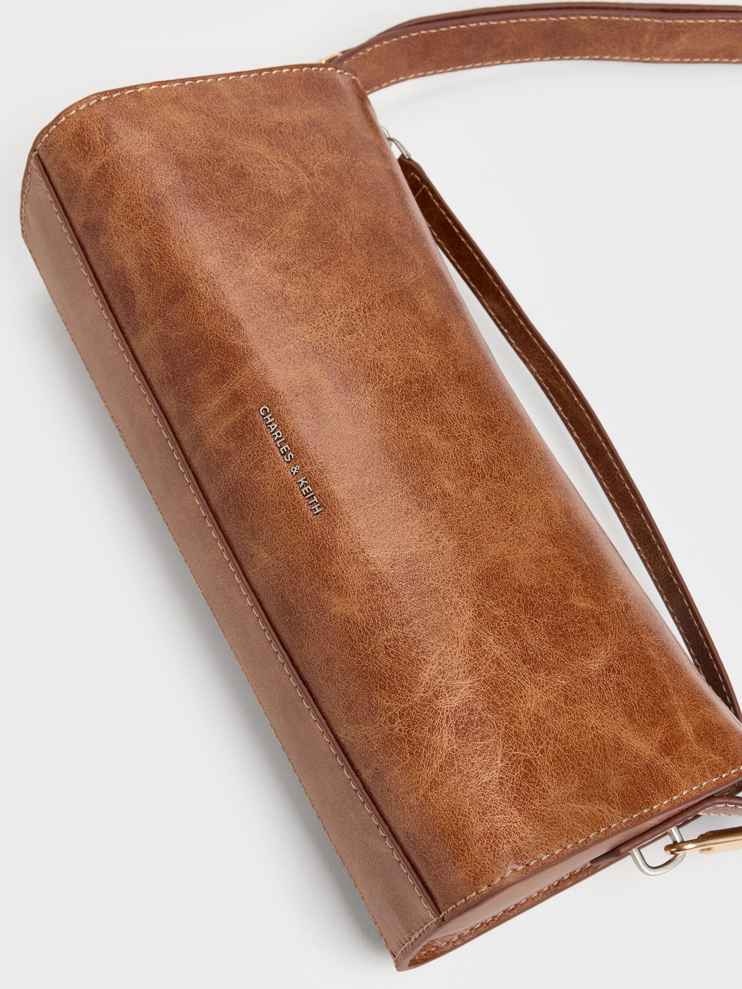 Delfina Elongated Shoulder Bag - Distressed Tan | CHARLES & KEITH