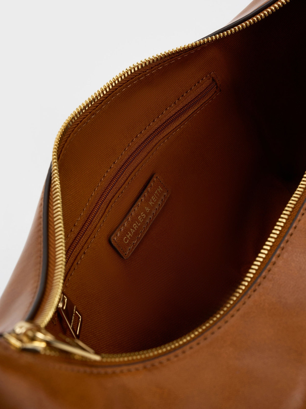Bessie Side-Pocket Hobo Bag - Distressed Tan | CHARLES & KEITH