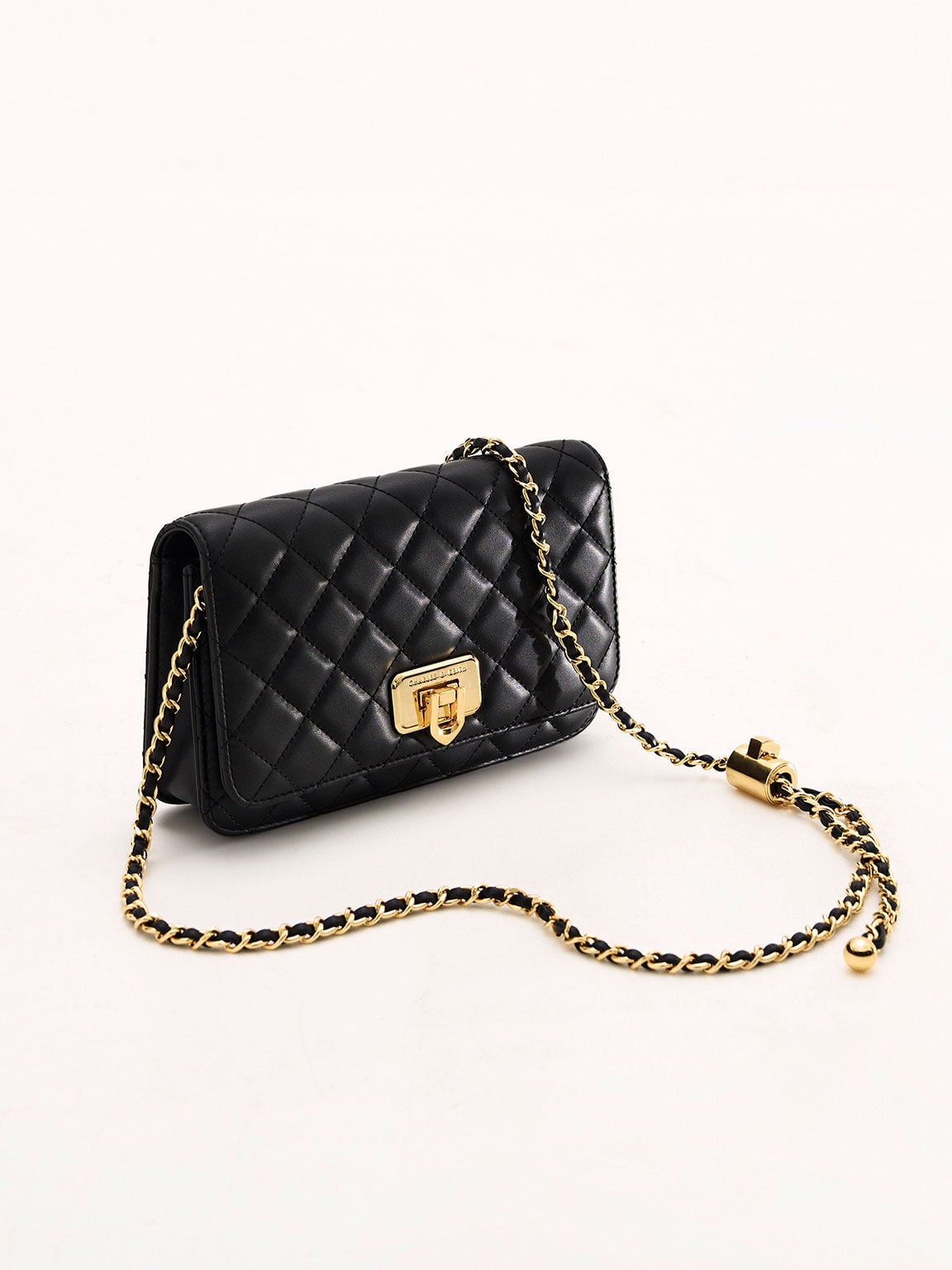 Cressida Quilted Push-Lock Clutch - Black | CHARLES & KEITH