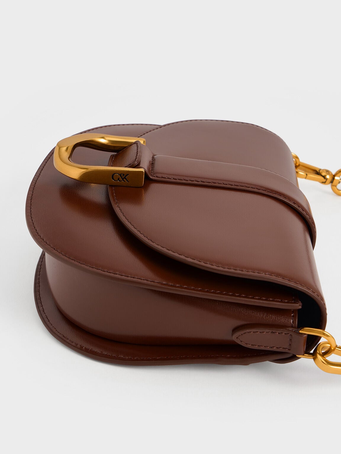 Gabine Leather Saddle Bag - Dark Brown | CHARLES & KEITH