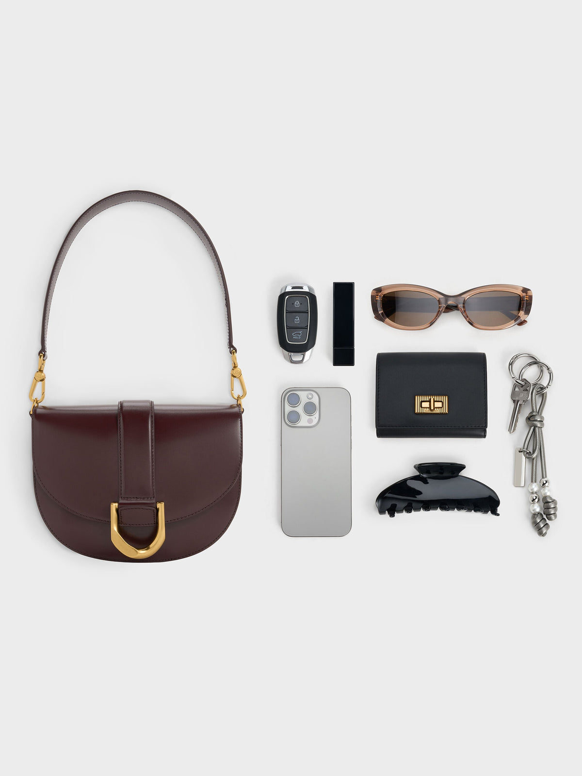 Gabine Leather Saddle Bag - Plum | CHARLES & KEITH