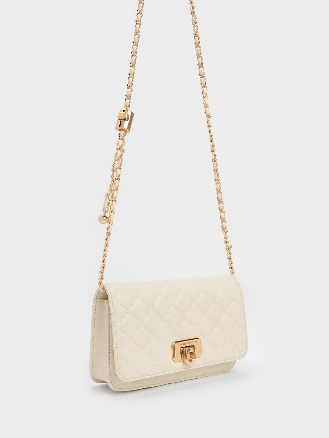 Cressida Quilted Push-Lock Clutch - Cream | CHARLES & KEITH