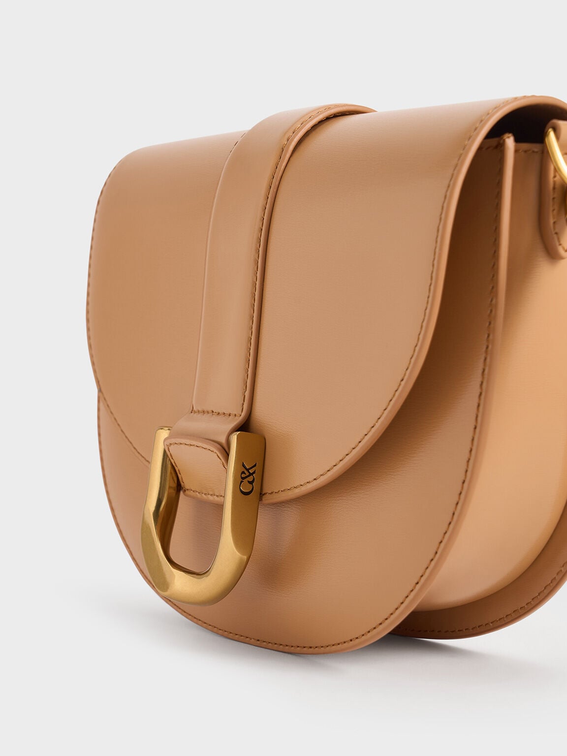 Gabine Leather Saddle Bag - Toffee | CHARLES & KEITH