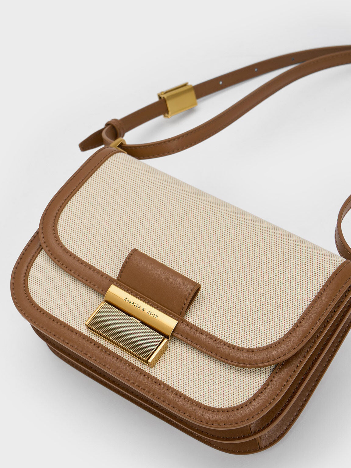 Charlot Canvas Crossbody Bag - Chocolate | CHARLES & KEITH