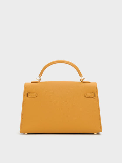 Tricha Knotted-Belt Top Handle Bag - Saffron Yellow | CHARLES & KEITH