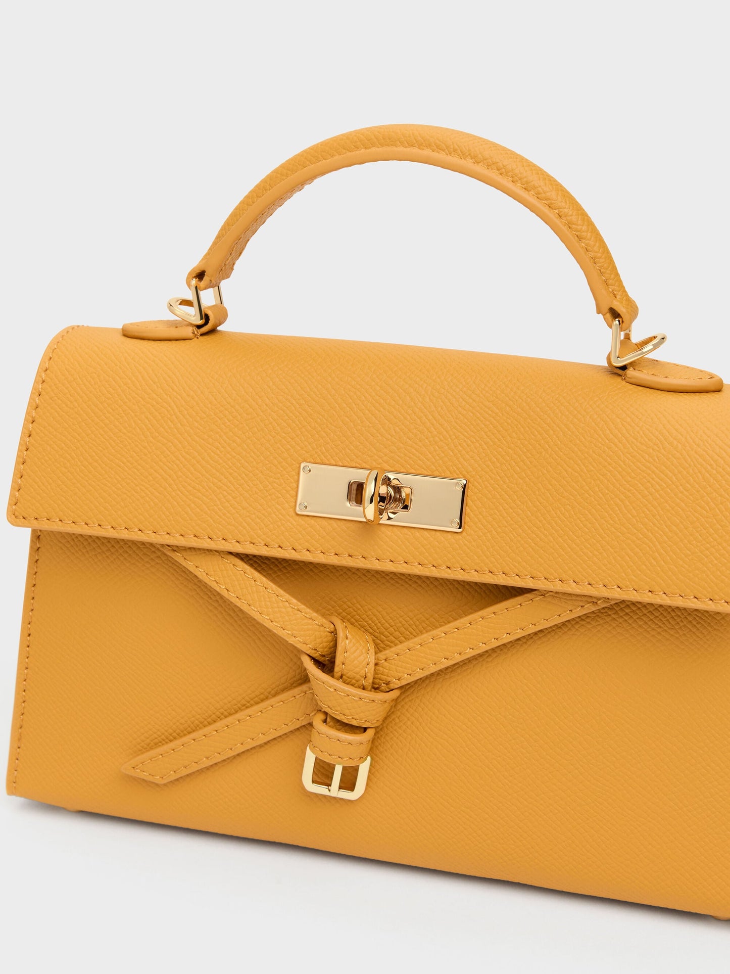 Tricha Knotted-Belt Top Handle Bag - Saffron Yellow | CHARLES & KEITH
