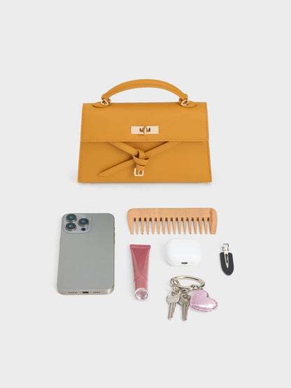 Tricha Knotted-Belt Top Handle Bag - Saffron Yellow | CHARLES & KEITH