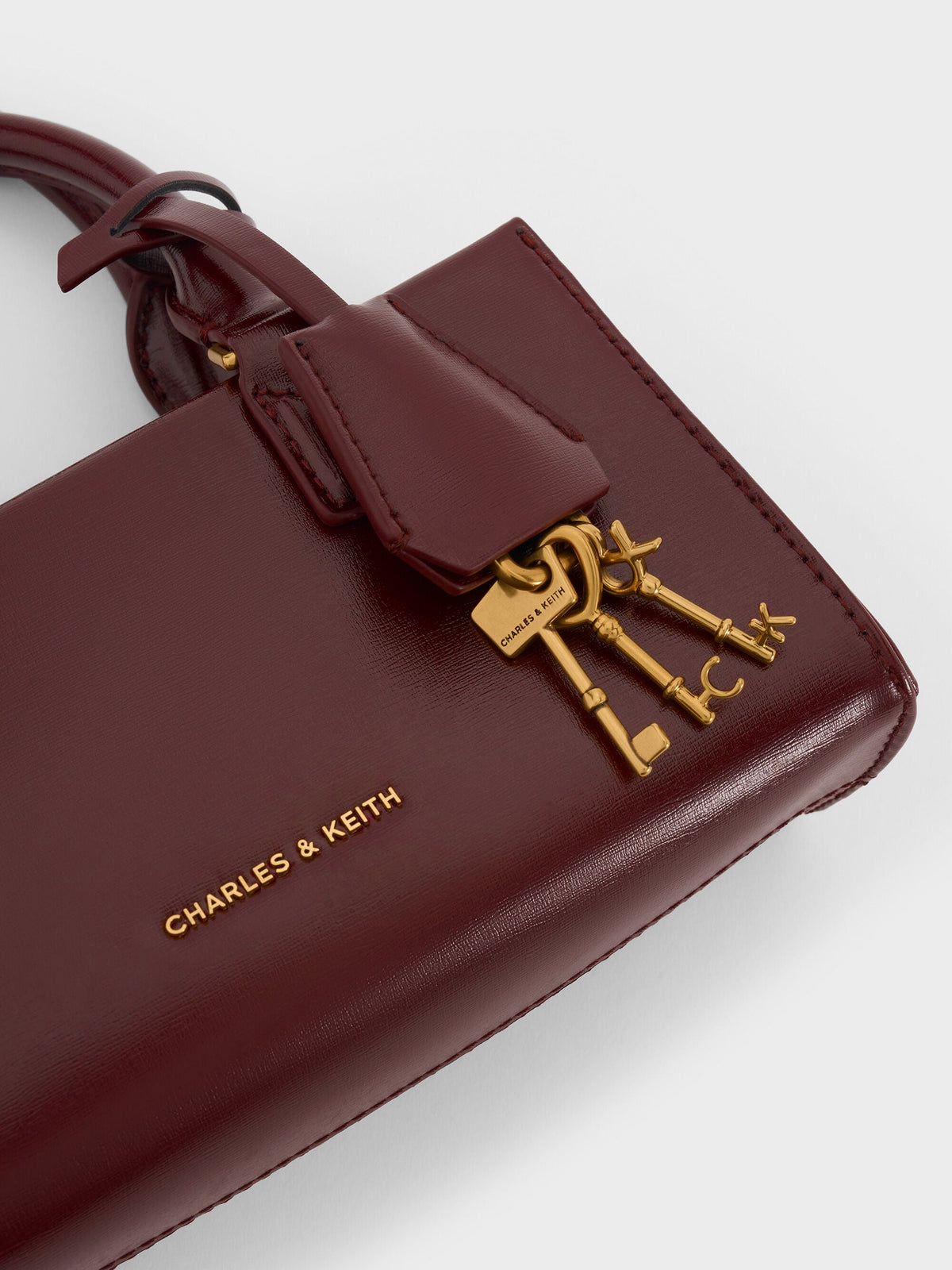Mini Kerry Top Handle Bag - Wineberry Red | CHARLES & KEITH