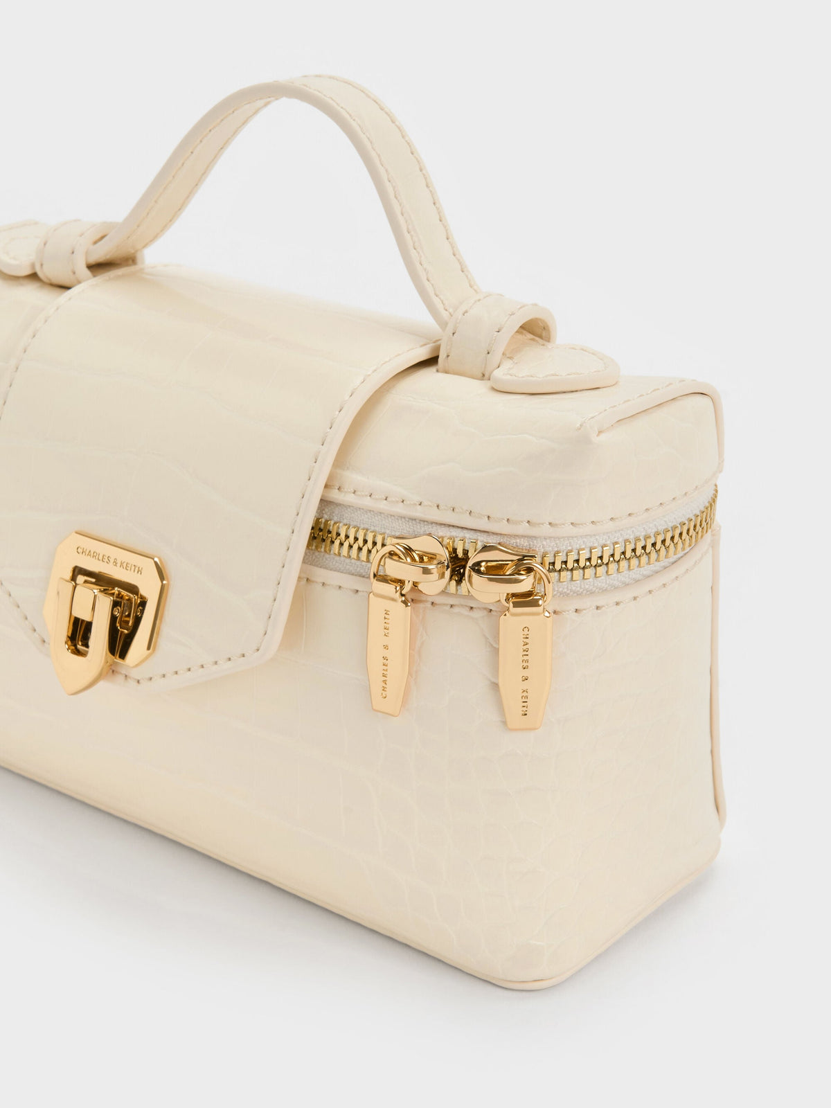 Arwen Croc-Effect Top Handle Vanity Bag - Cream | CHARLES & KEITH