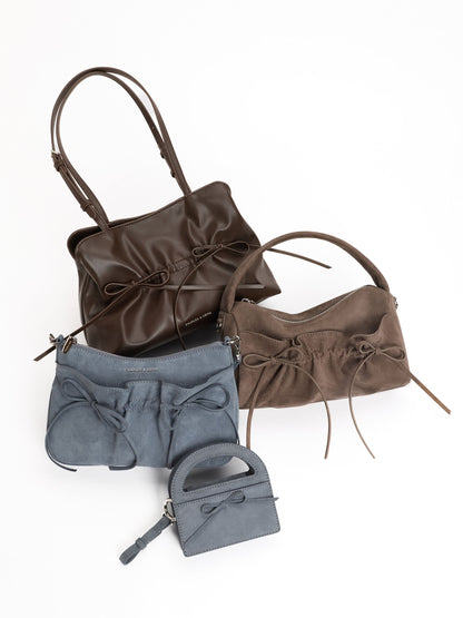 Reese Bow Top Handle Wristlet - Smoky Blue | CHARLES & KEITH