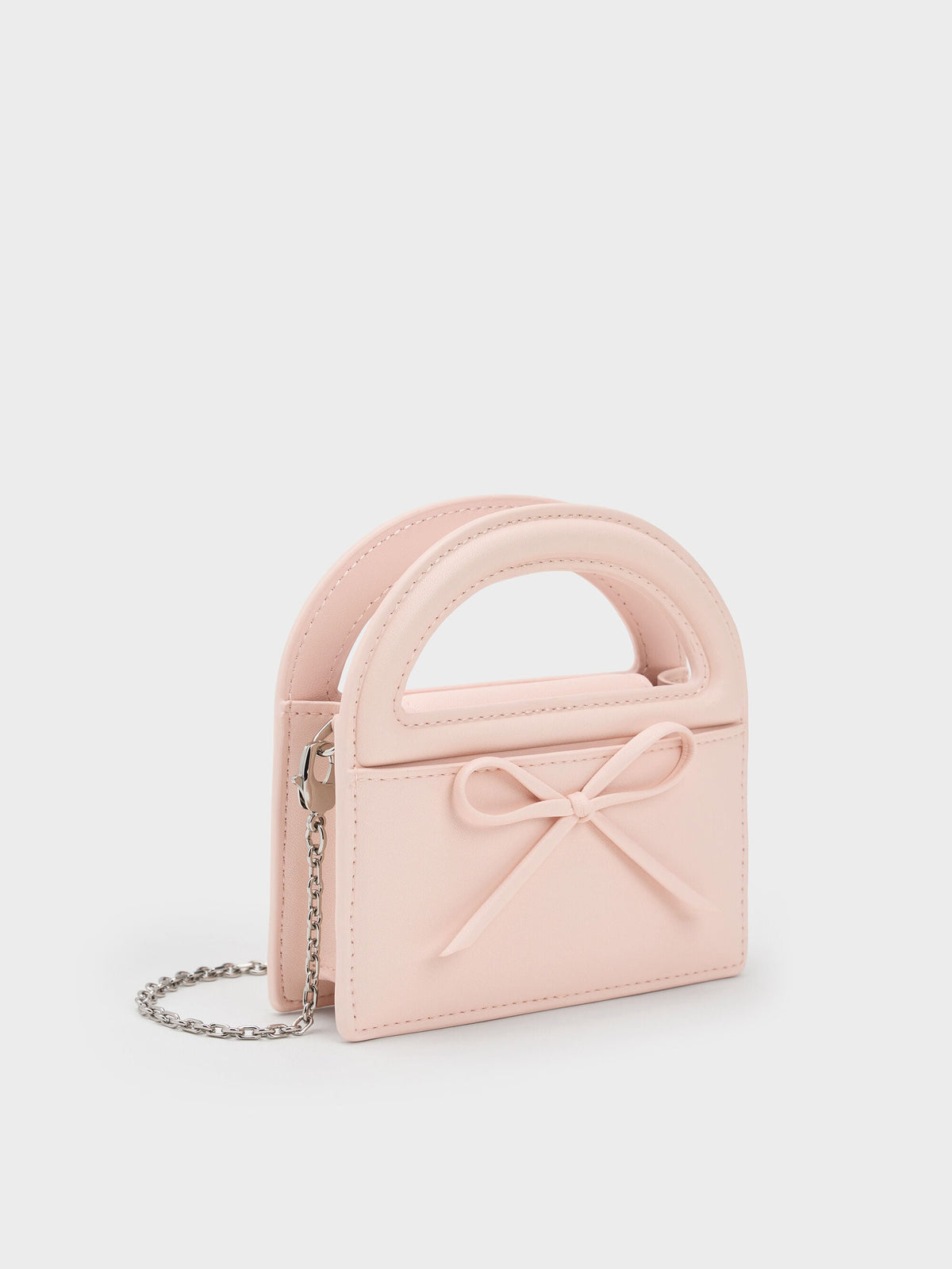 Reese Bow Top Handle Wristlet - Soft Pink | CHARLES & KEITH