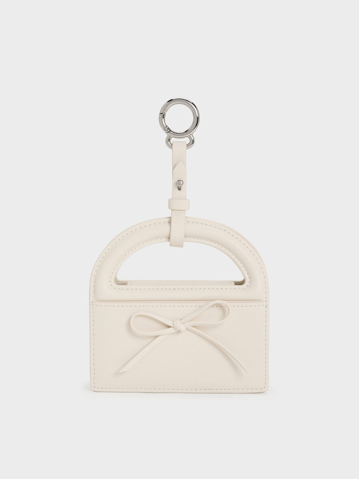 Reese Bow Top Handle Wristlet - Cream | CHARLES & KEITH