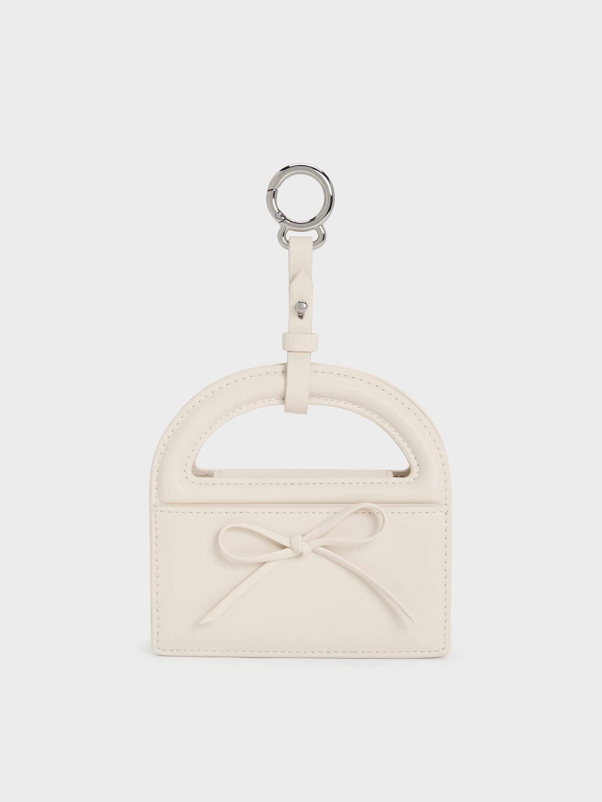 Reese Bow Top Handle Wristlet - Cream | CHARLES & KEITH