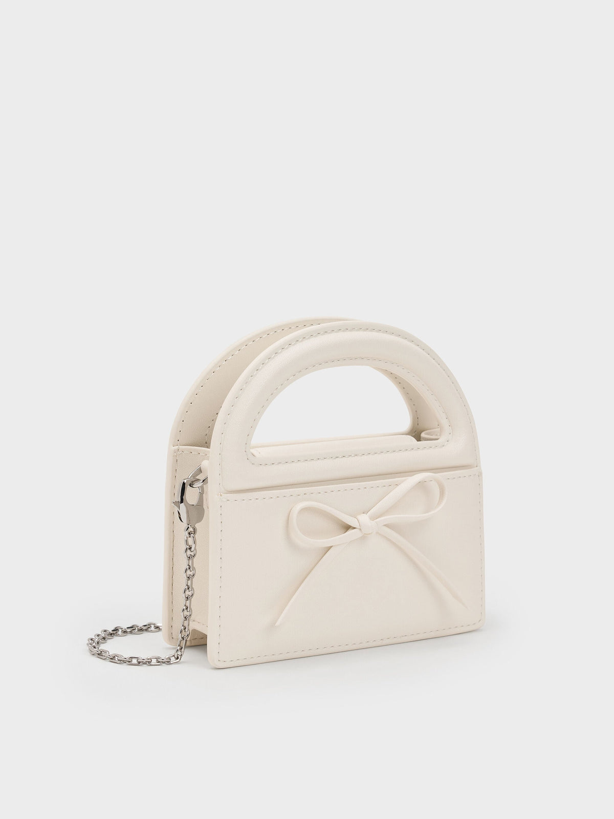 Reese Bow Top Handle Wristlet - Cream | CHARLES & KEITH