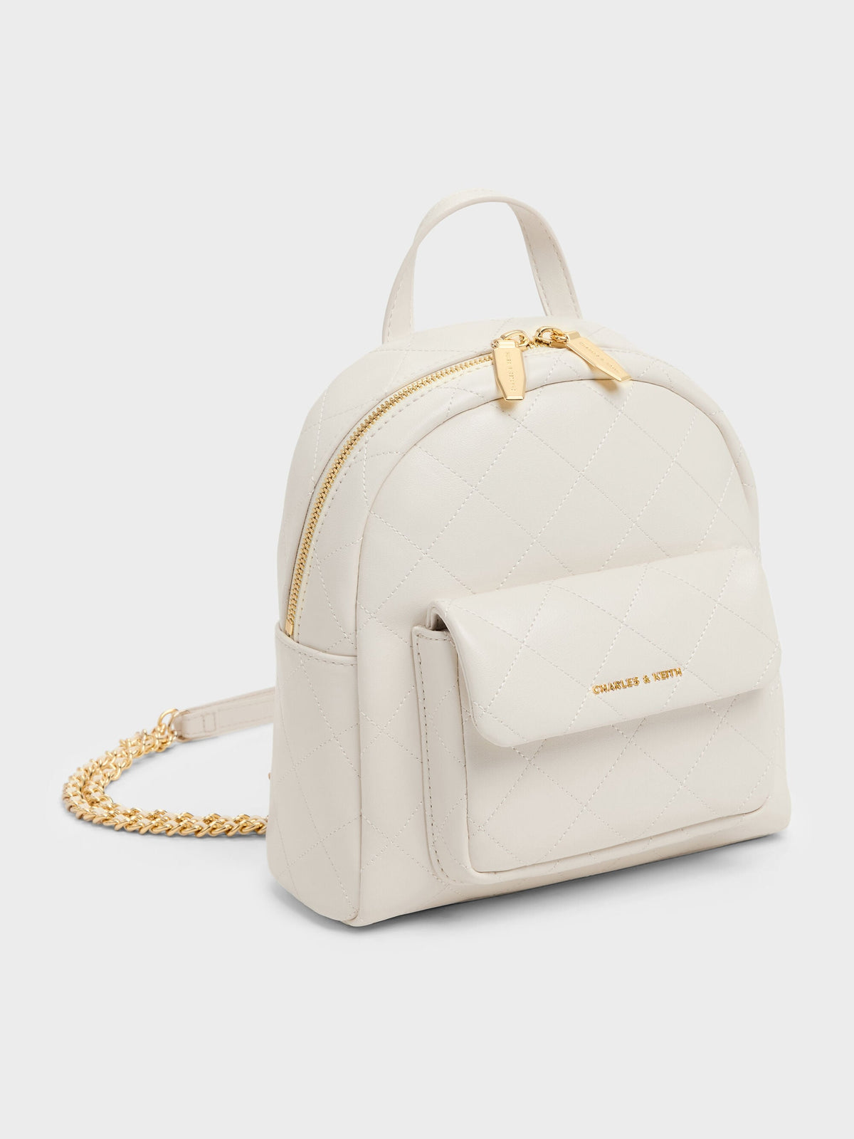 Alva Quilted Front-Pocket Backpack - Cream | CHARLES & KEITH