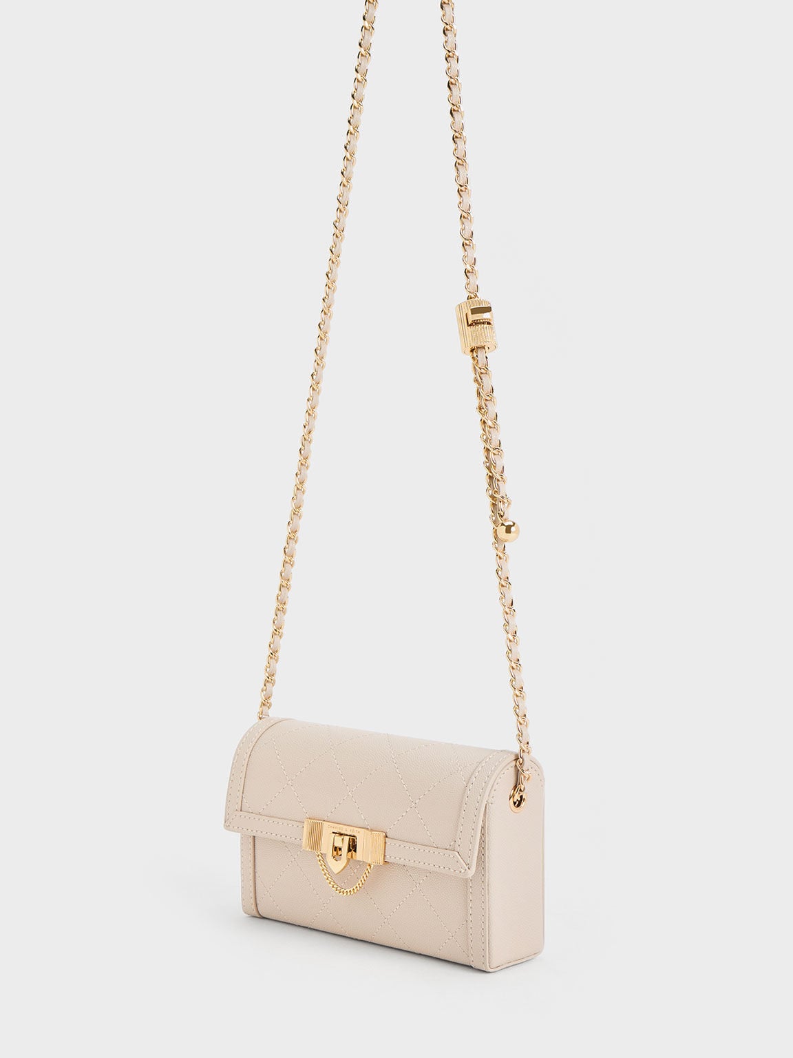 Tallulah Quilted Push-Lock Clutch - Oat | CHARLES & KEITH