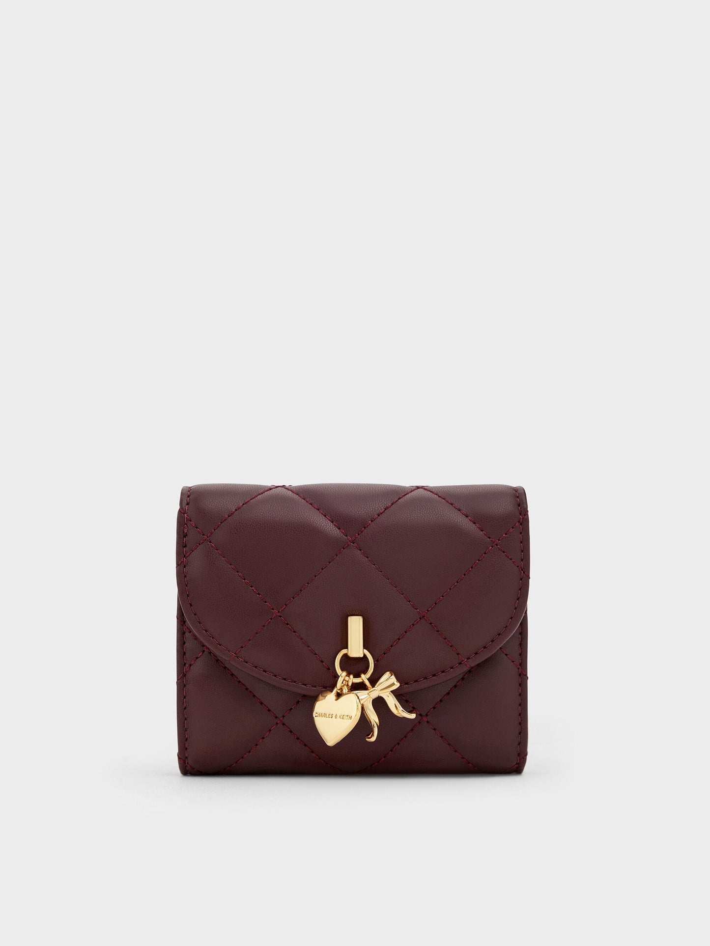 Arrietty Quilted Curved-Flap Wallet - Wineberry Red | CHARLES & KEITH
