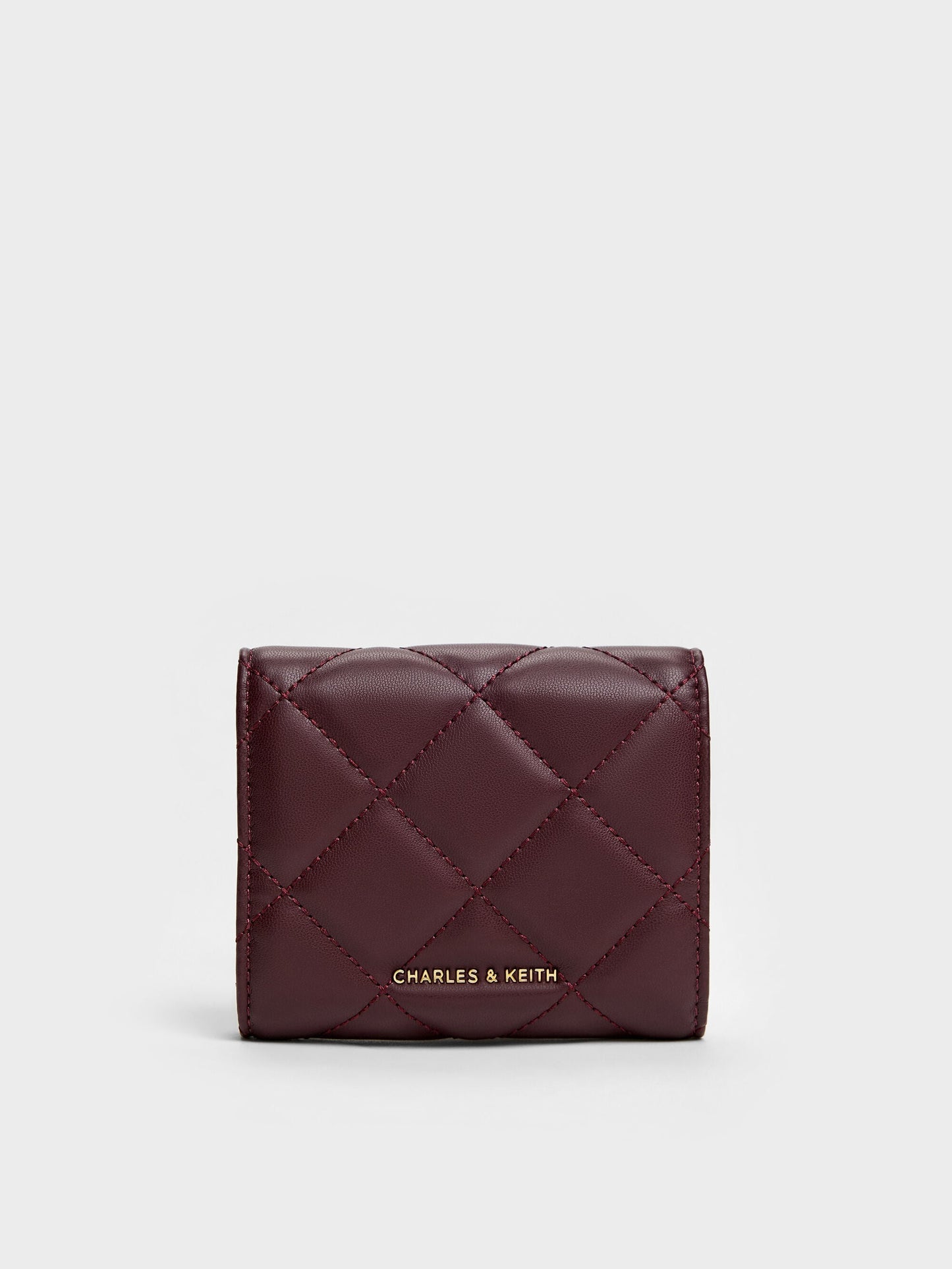 Arrietty Quilted Curved-Flap Wallet - Wineberry Red | CHARLES & KEITH
