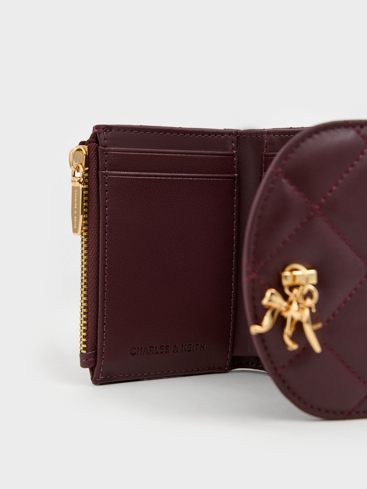 Arrietty Quilted Curved-Flap Wallet - Wineberry Red | CHARLES & KEITH