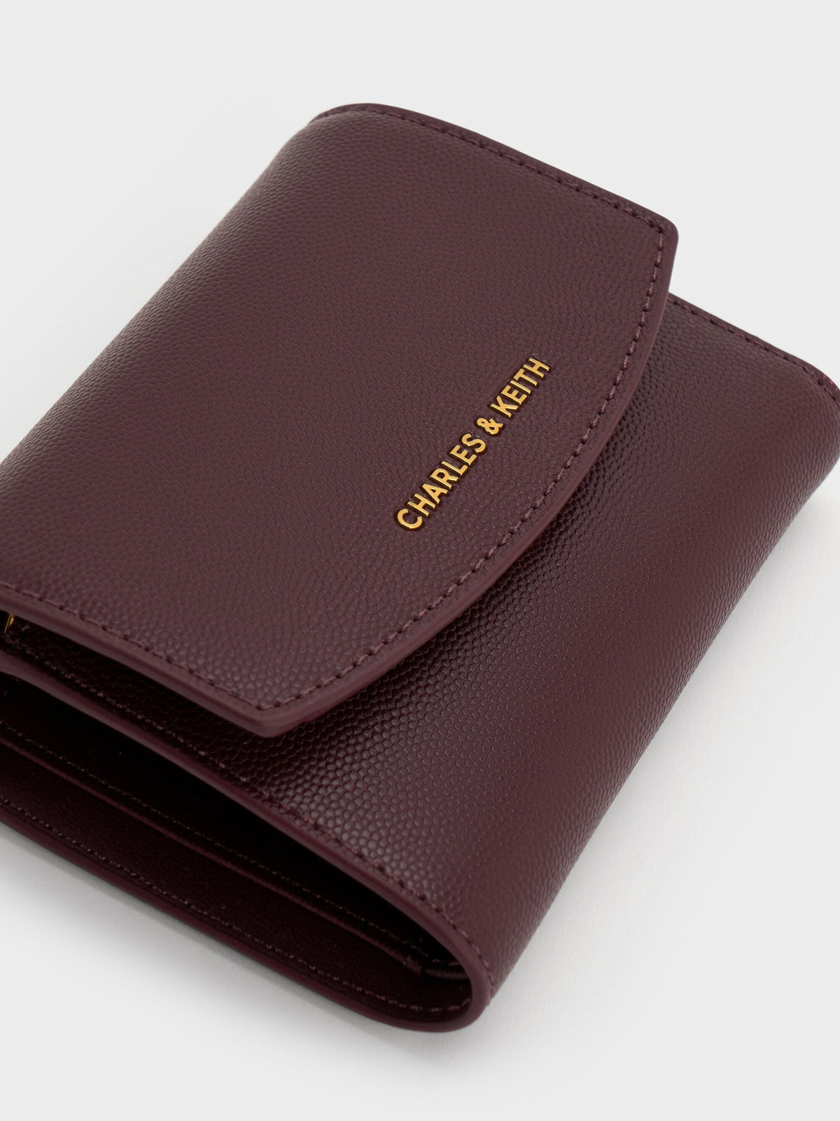 Briony Curved Flap Wallet - Wineberry Red | CHARLES & KEITH