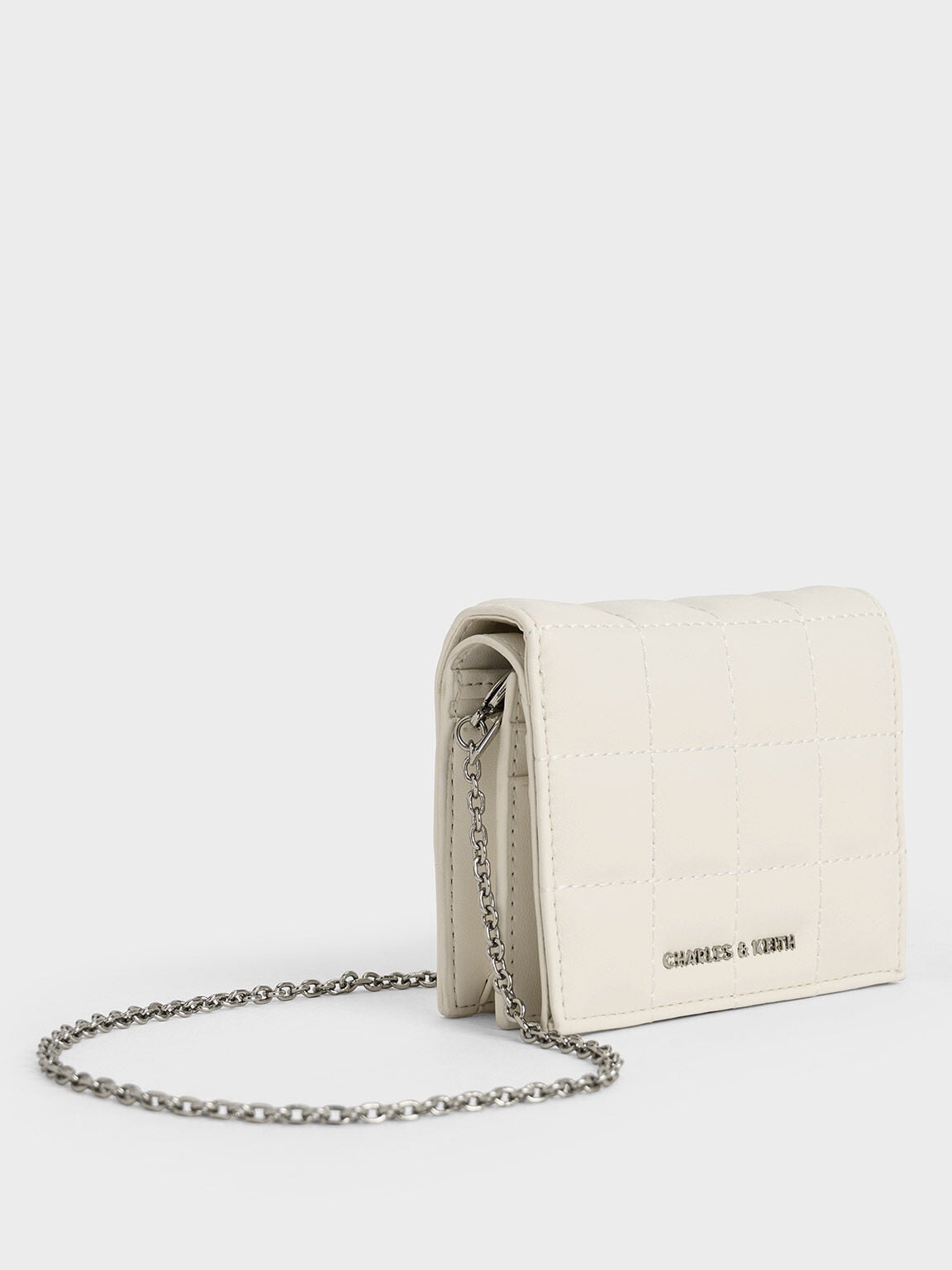 Cassia Quilted Wallet On Chain - Cream | CHARLES & KEITH
