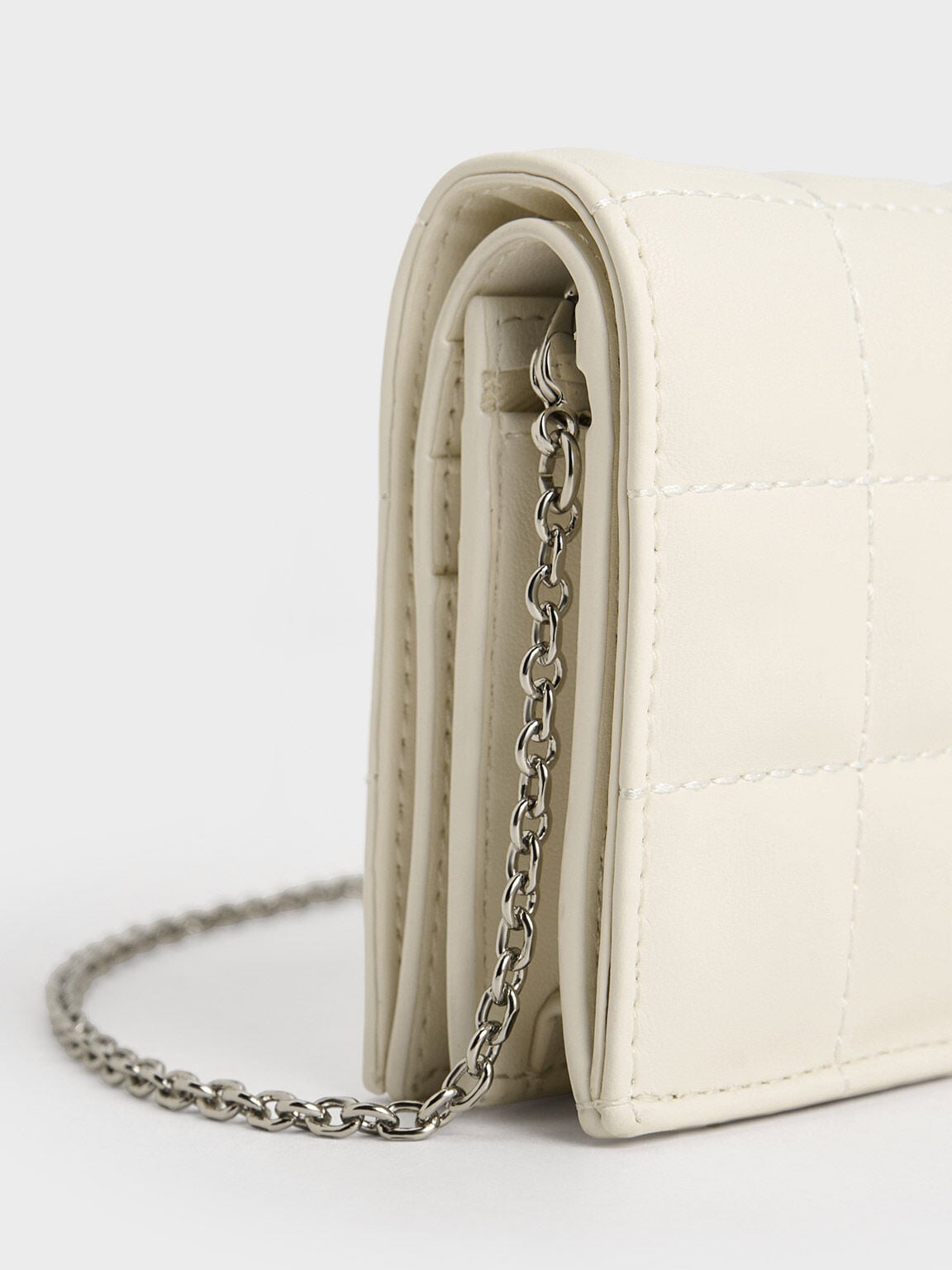Cassia Quilted Wallet On Chain - Cream | CHARLES & KEITH