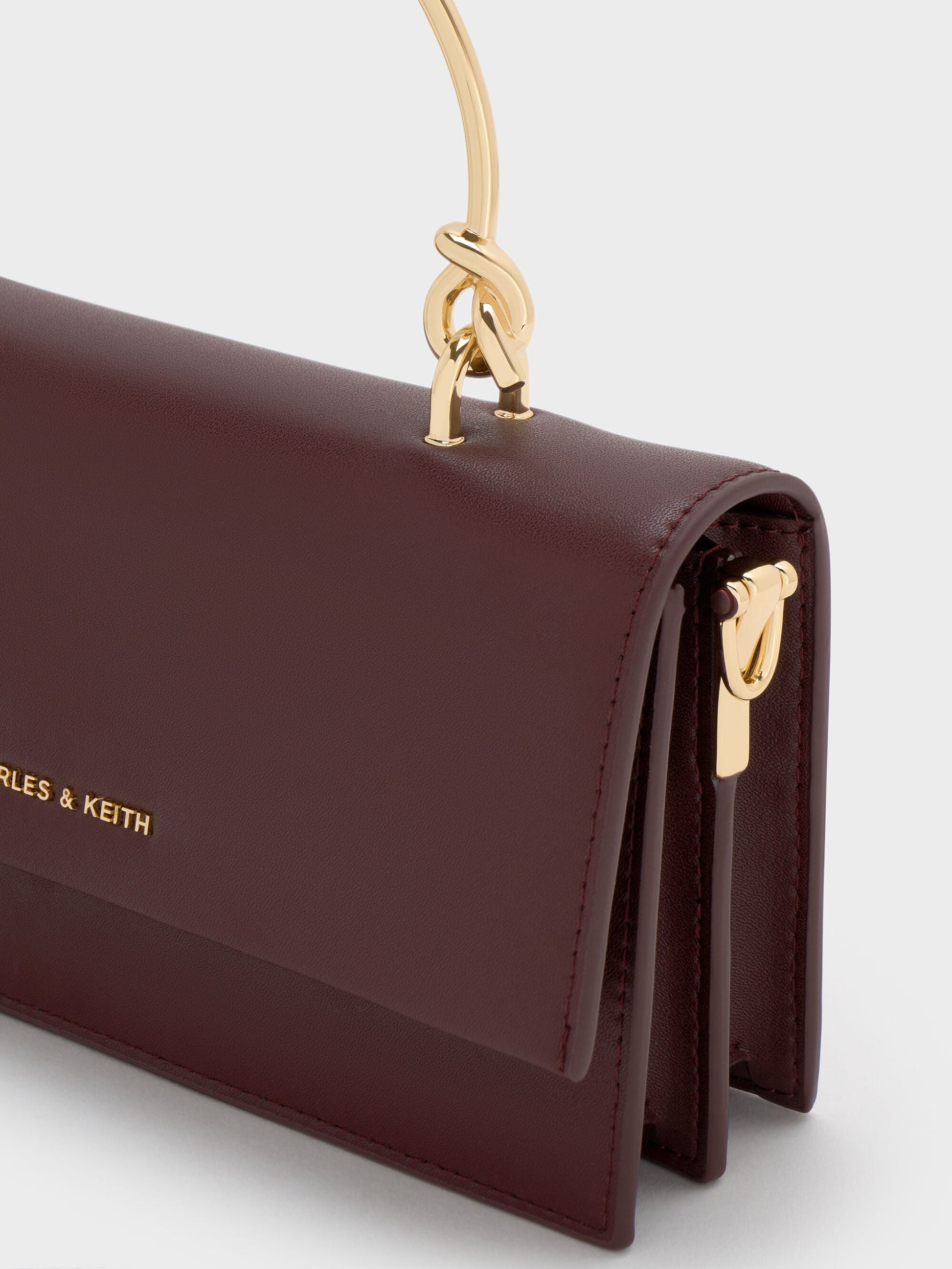 Kristine Sculptural-Handle Long Wallet - Wineberry Red | CHARLES & KEITH