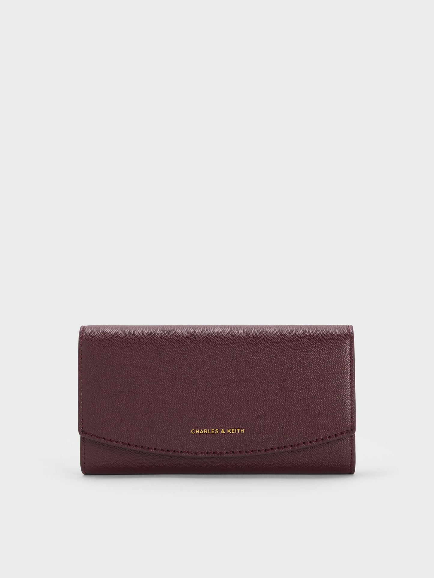 Briony Curved Flap Long Wallet - Wineberry Red | CHARLES & KEITH
