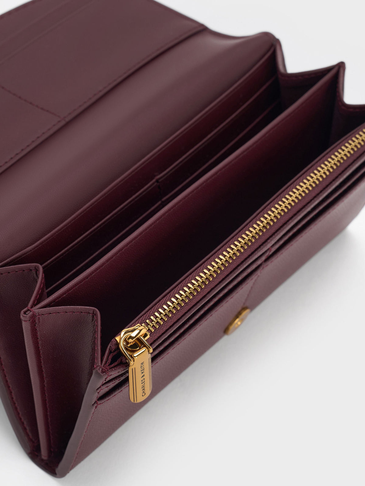 Briony Curved Flap Long Wallet - Wineberry Red | CHARLES & KEITH