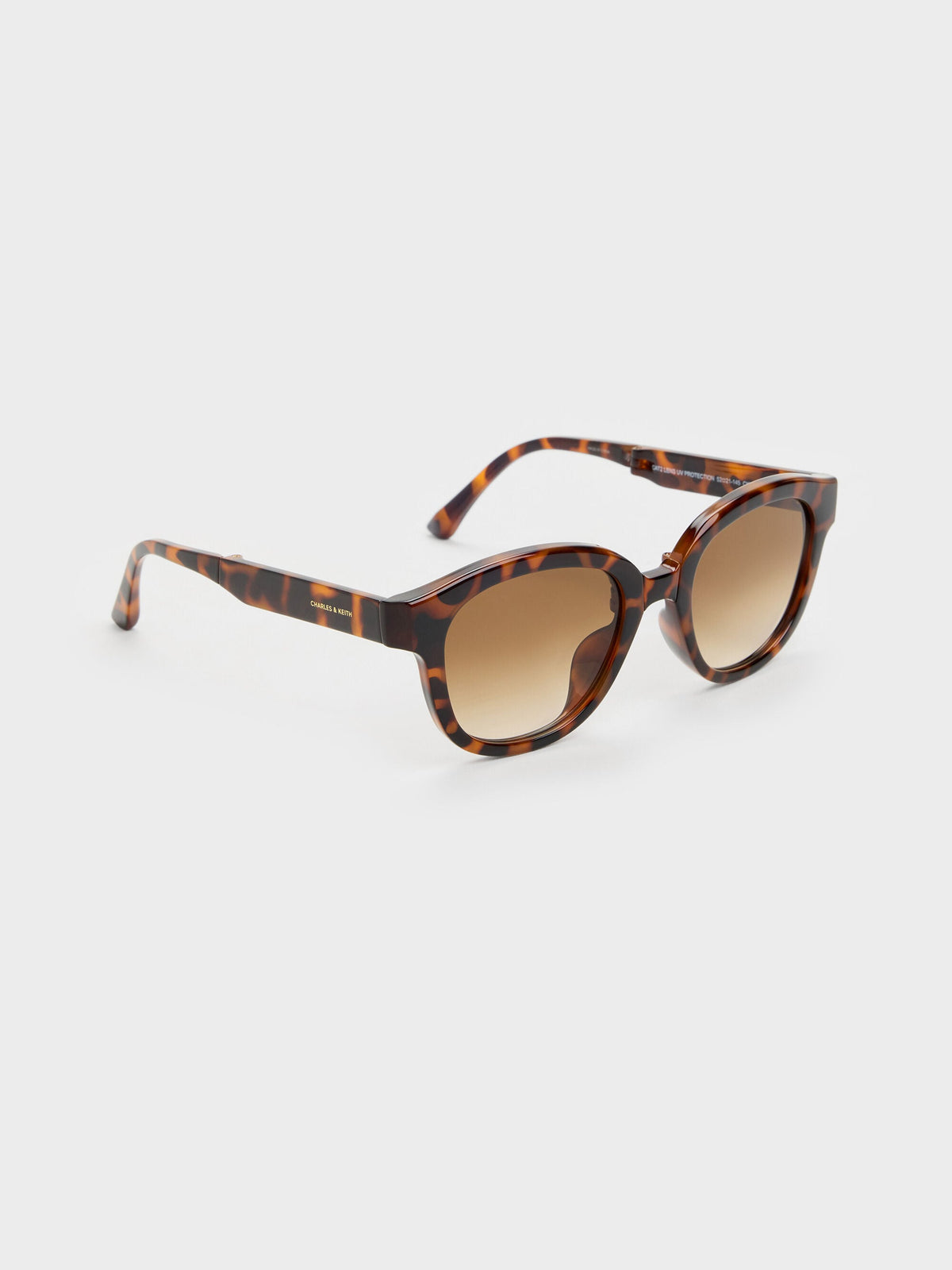 Brea Round Sunglasses - T. Shell | CHARLES & KEITH