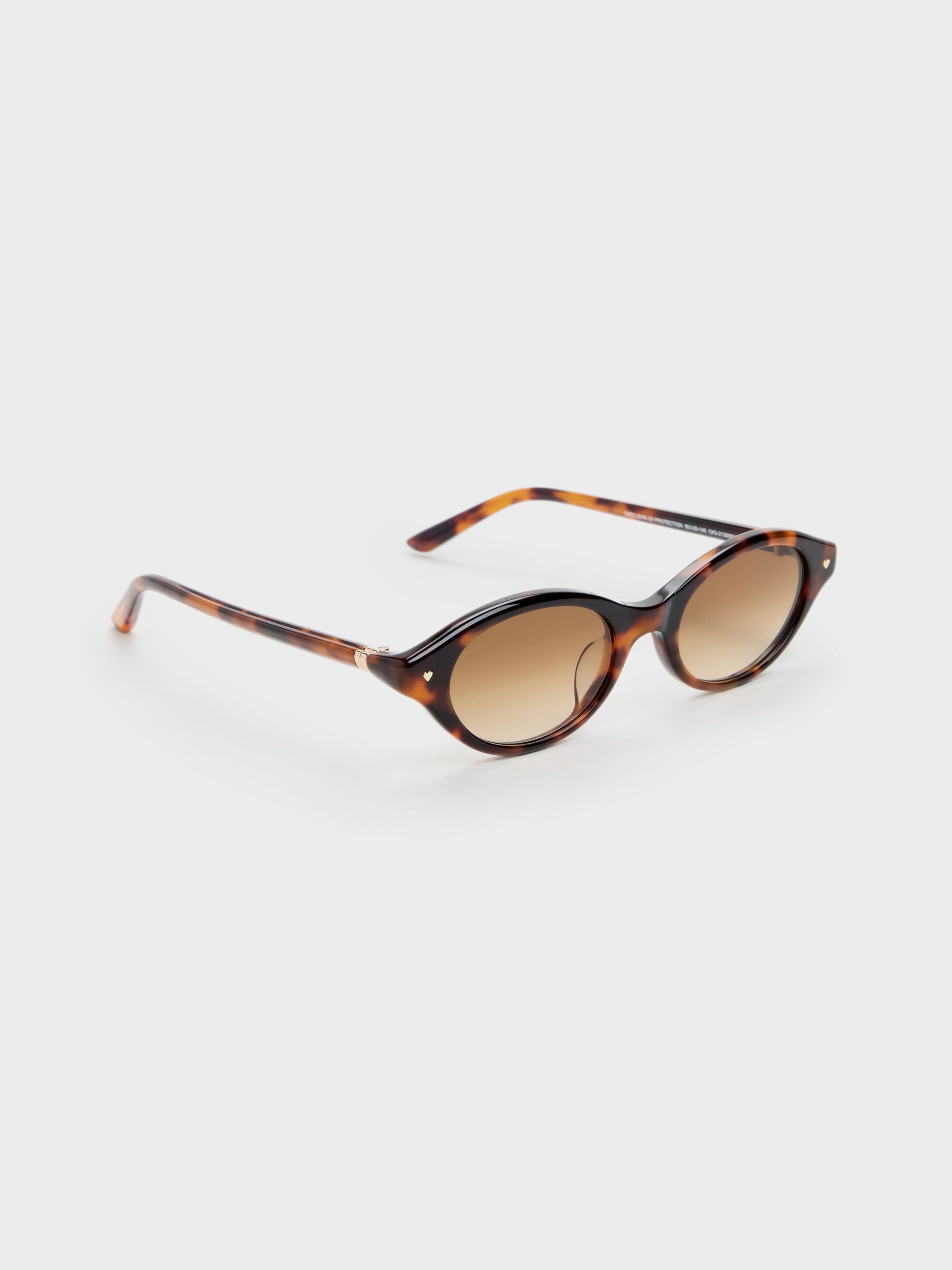 Pecola Oval Sunglasses - T. Shell | CHARLES & KEITH