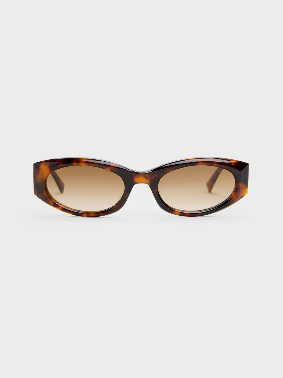 Aubrey Oval Sunglasses - T. Shell | CHARLES & KEITH