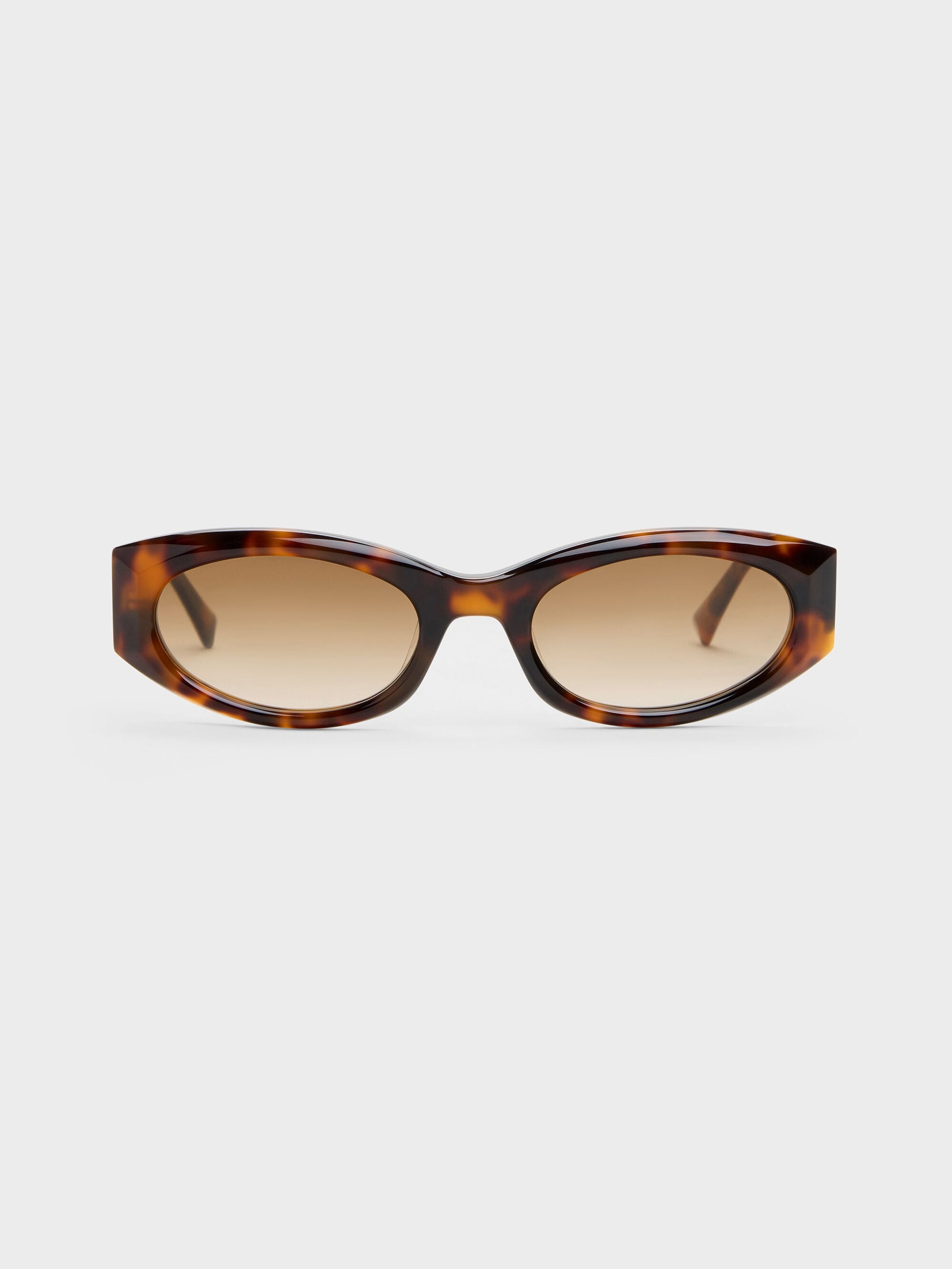 Aubrey Oval Sunglasses - T. Shell | CHARLES & KEITH