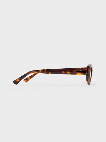 Aubrey Oval Sunglasses - T. Shell | CHARLES & KEITH