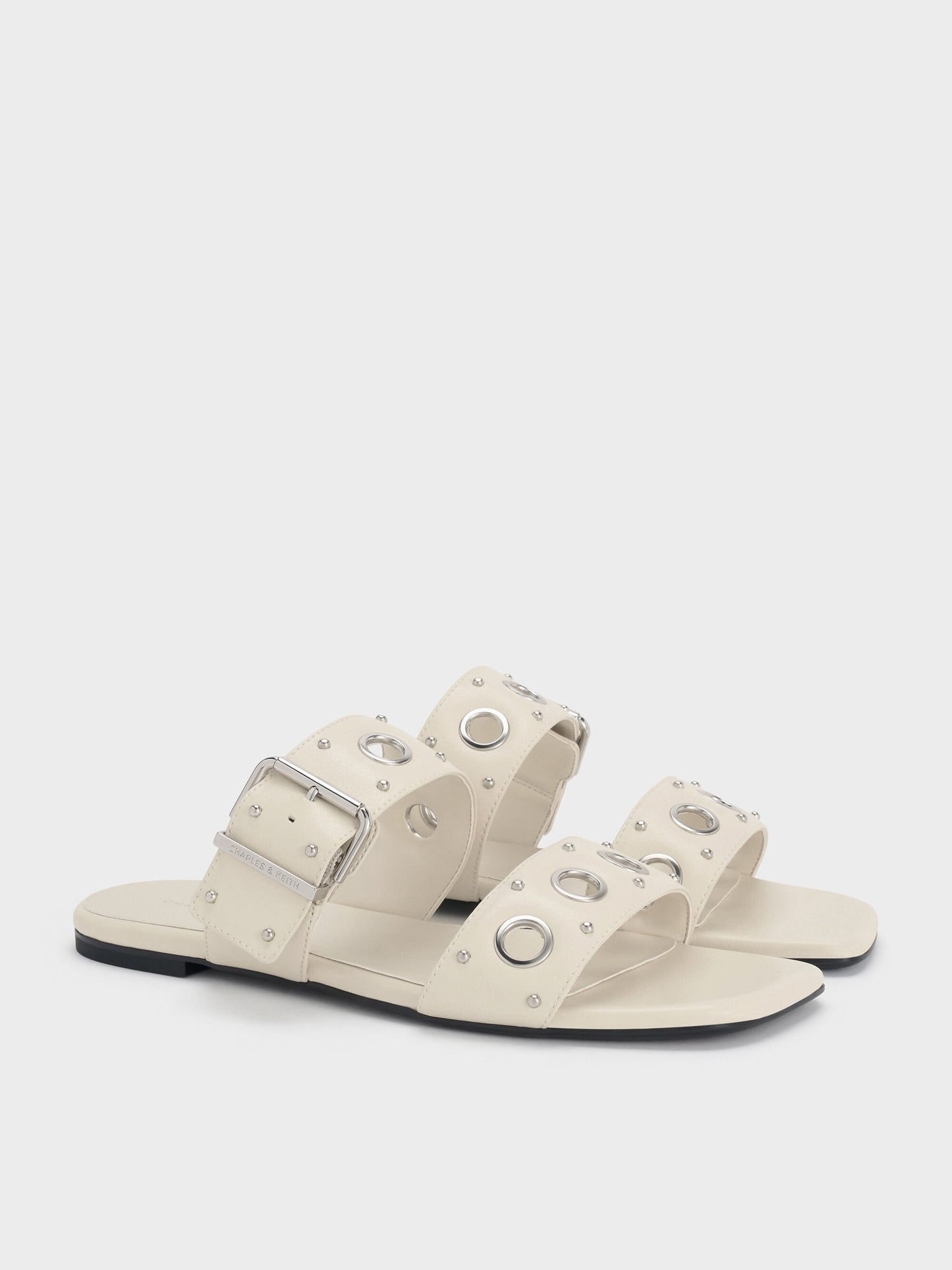 Grommet Buckled Slides - Chalk | CHARLES & KEITH