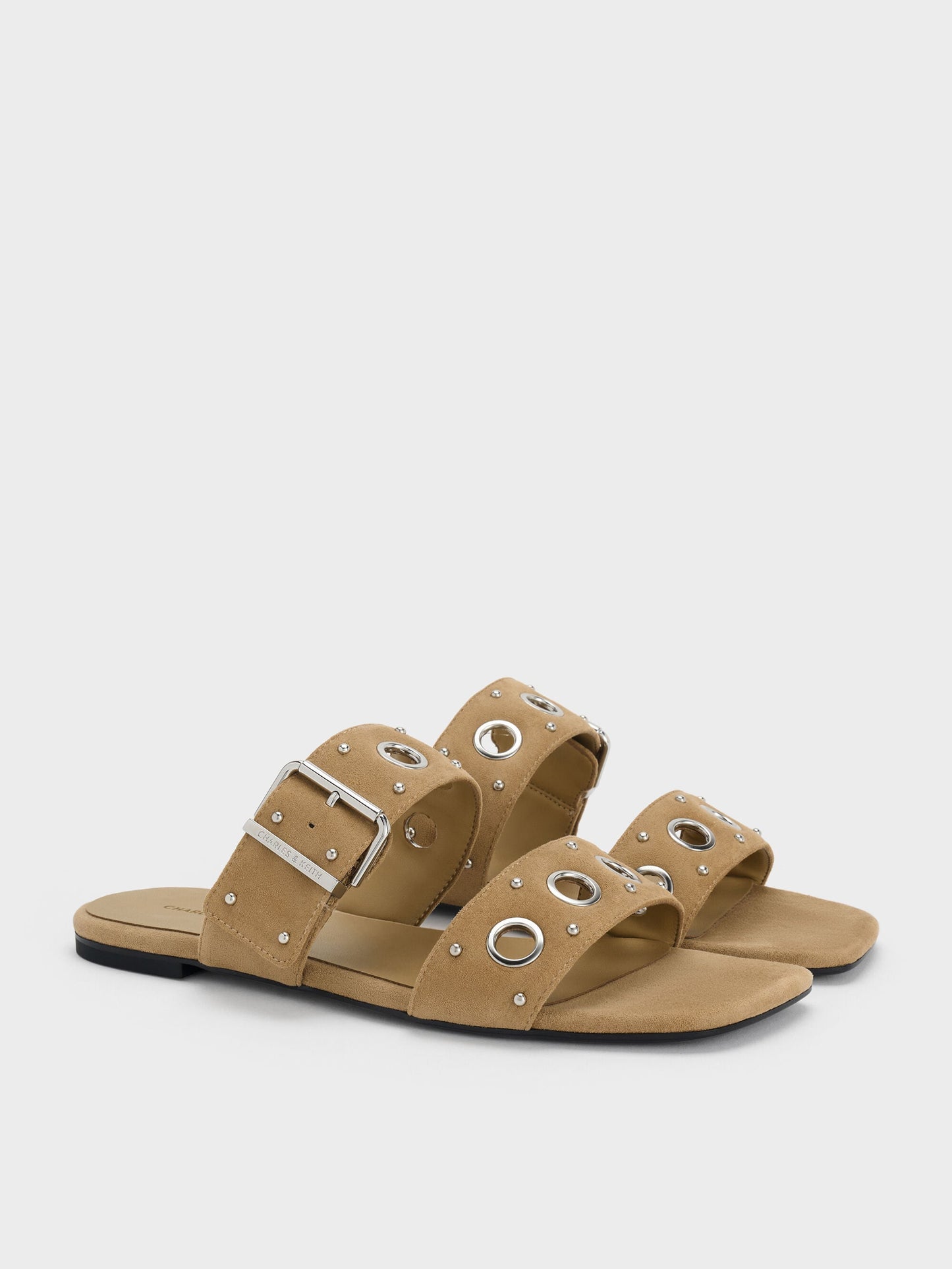 Faux Suede Grommet Buckled Slides - Sand | CHARLES & KEITH