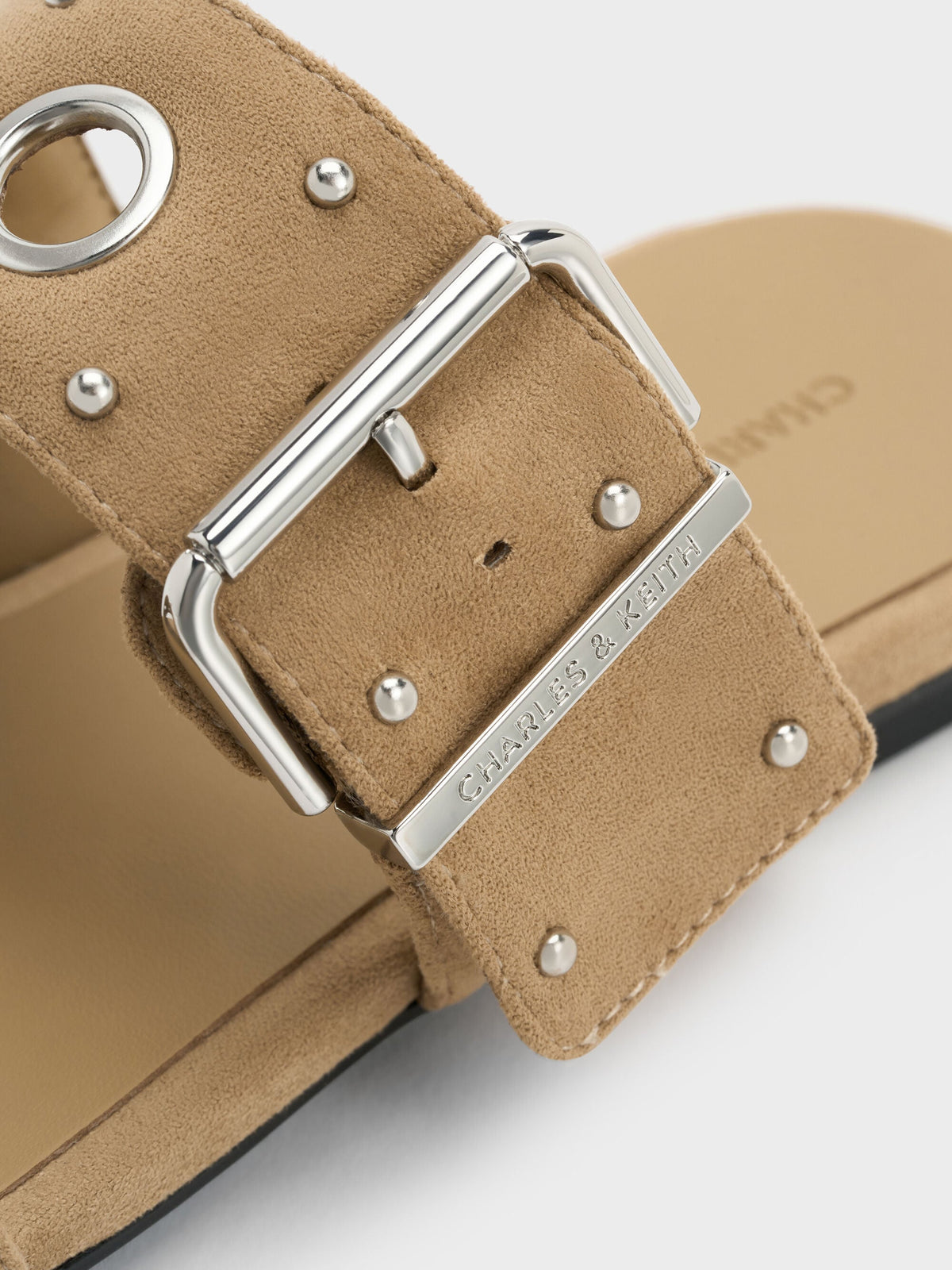 Faux Suede Grommet Buckled Slides - Sand | CHARLES & KEITH
