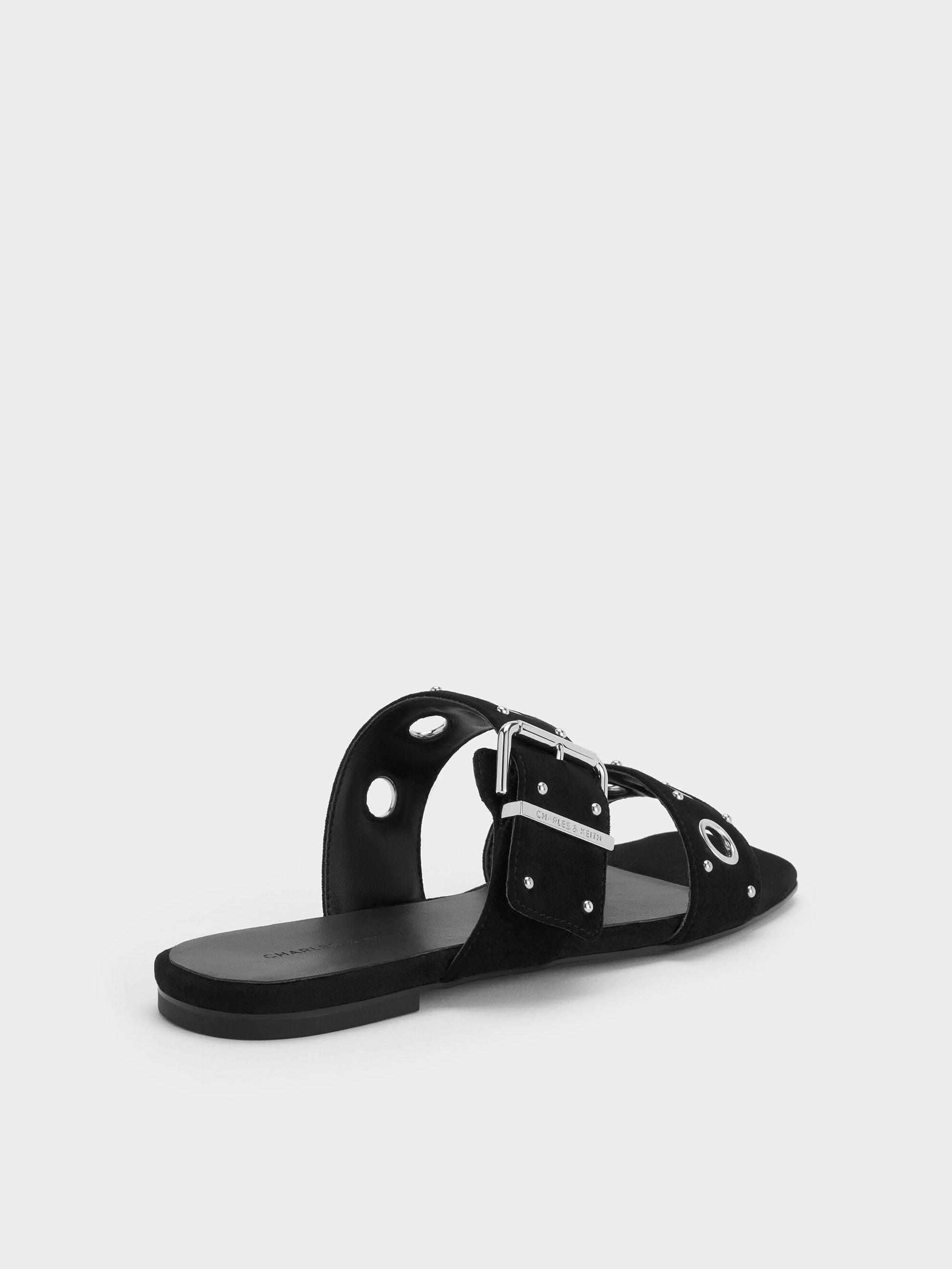 Faux Suede Grommet Buckled Slides - Black Textured | CHARLES & KEITH