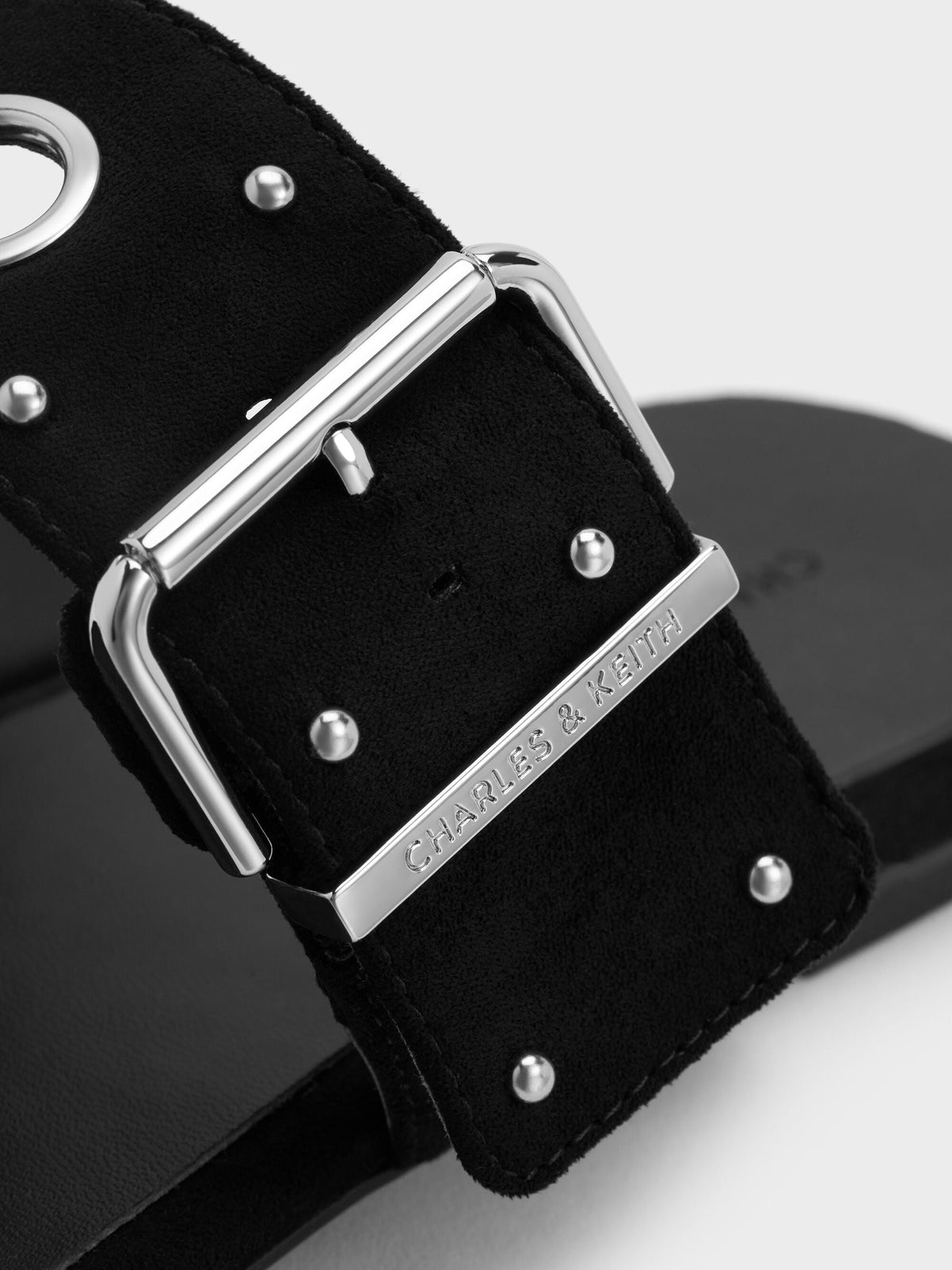 Faux Suede Grommet Buckled Slides - Black Textured | CHARLES & KEITH
